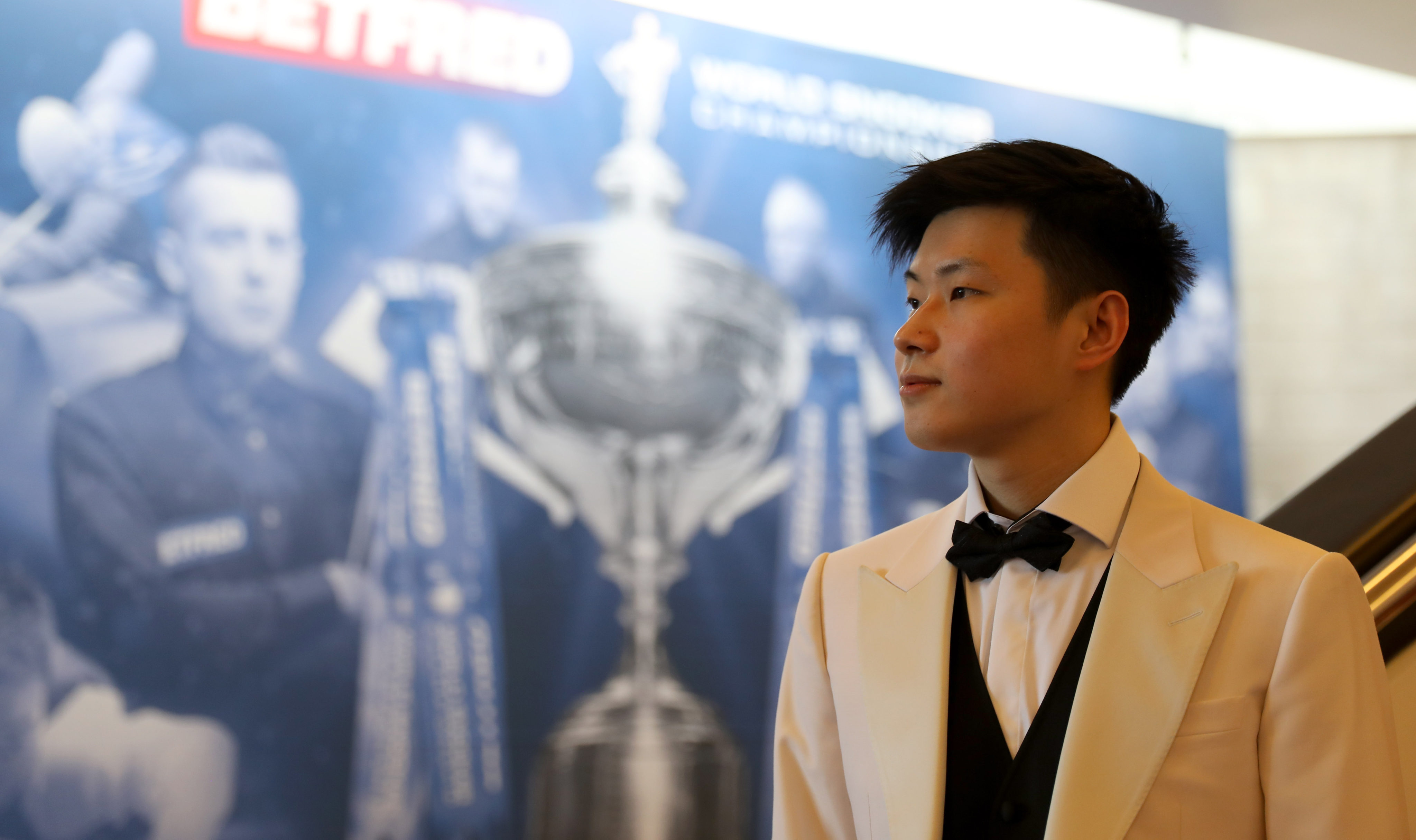 Zhao Xintong is one of four Chinese players competing at the 2022 World Snooker Championship in Sheffield. Photo: Xinhua