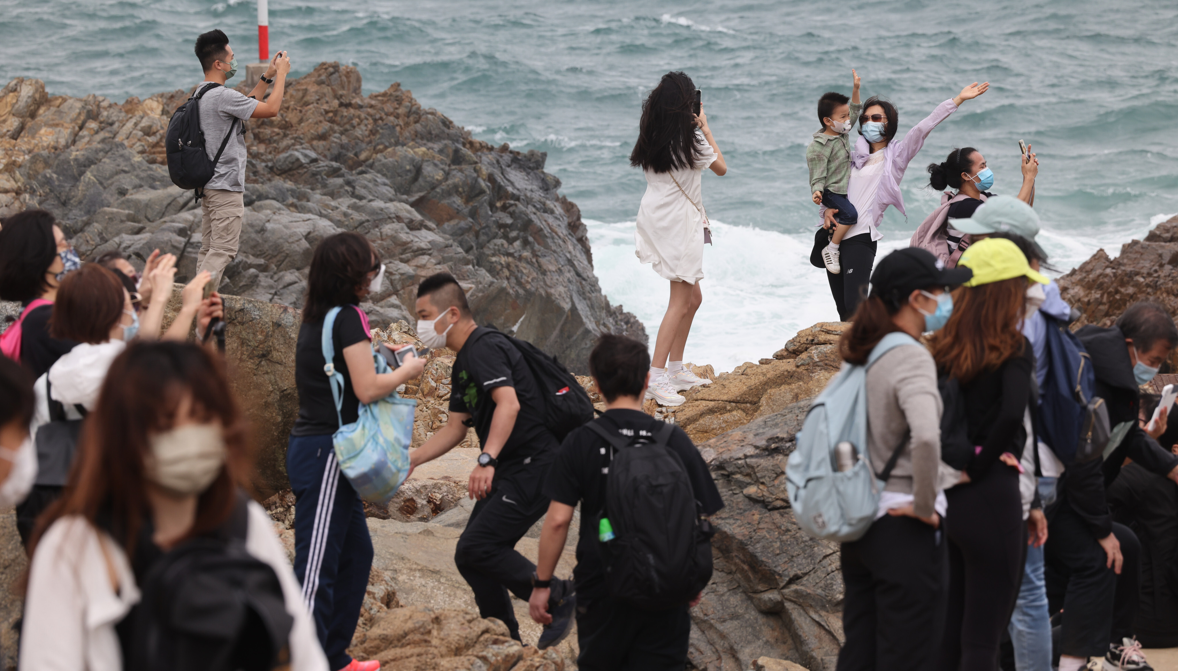 Visitors enjoying the outdoors in Hong Kong’s Shek O on April 16. These distressing pandemic years are minor sufferings compared to many eras of hardship that have gone before. Photo: Jelly Tse