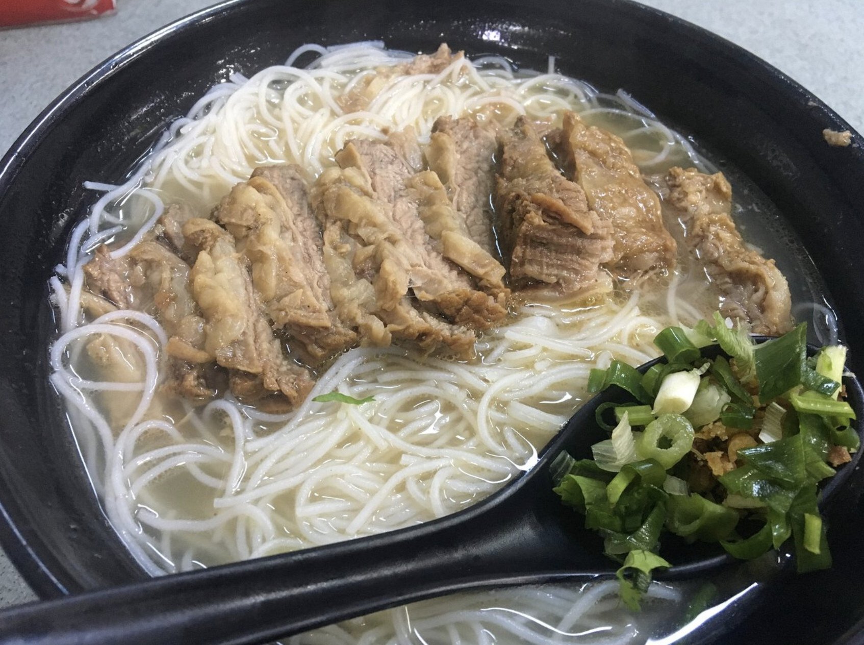 Chiu Hing Restaurant’s beef brisket flat noodle soup.