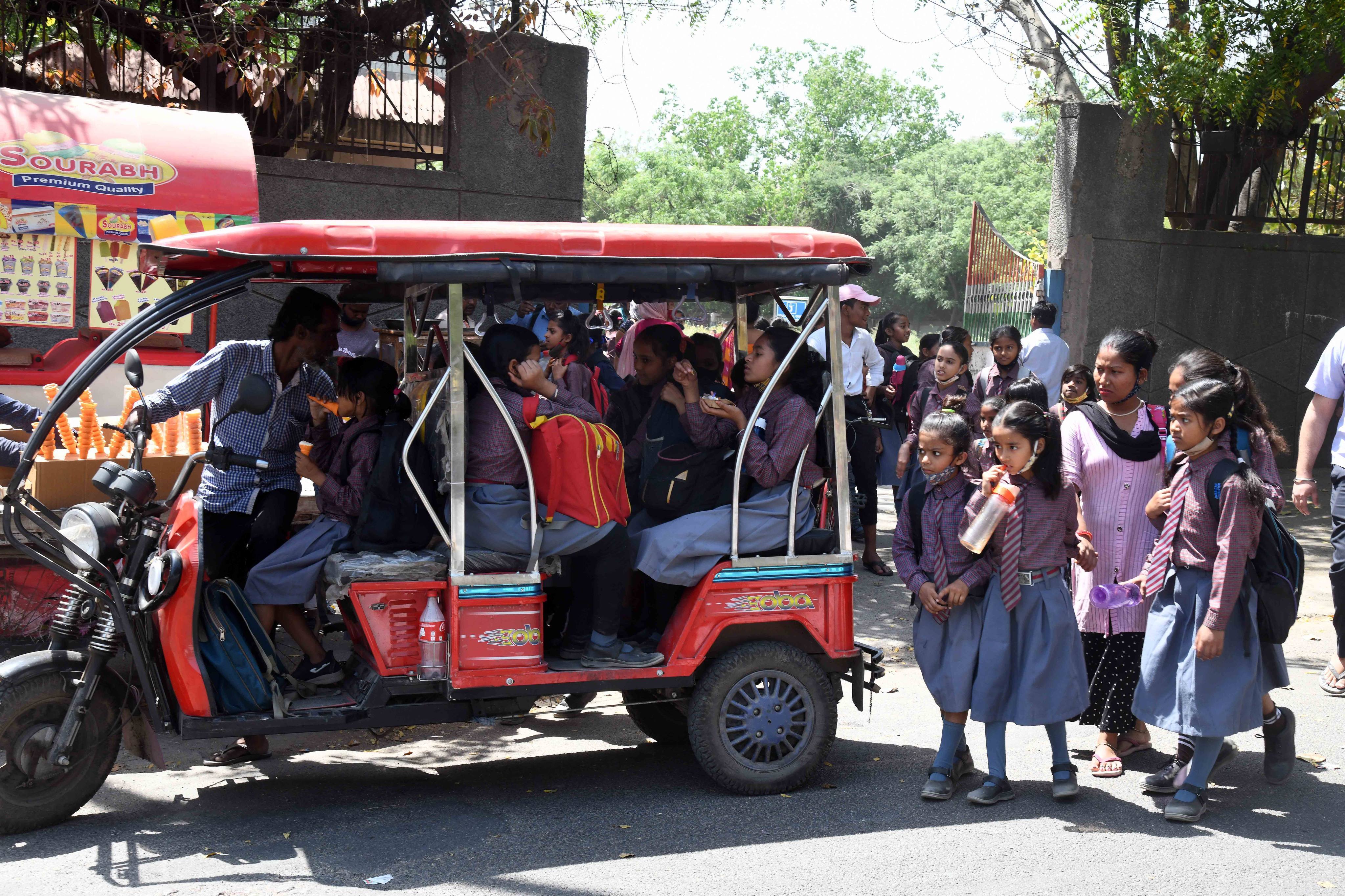 Students on their way home from school. New Delhi reopened schools fully on April 1. Photo: Xinhua
