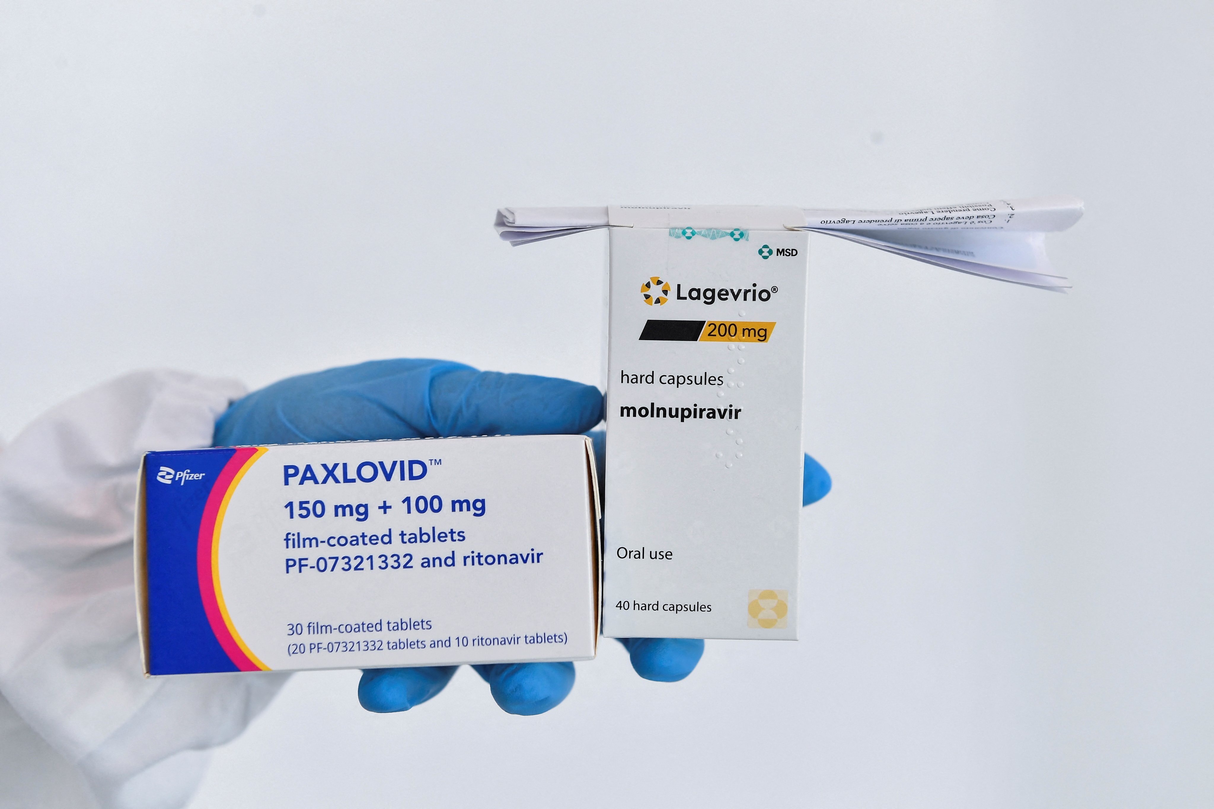Covid-19 oral pills Paxlovid and molnupiravir. Photo: Reuters