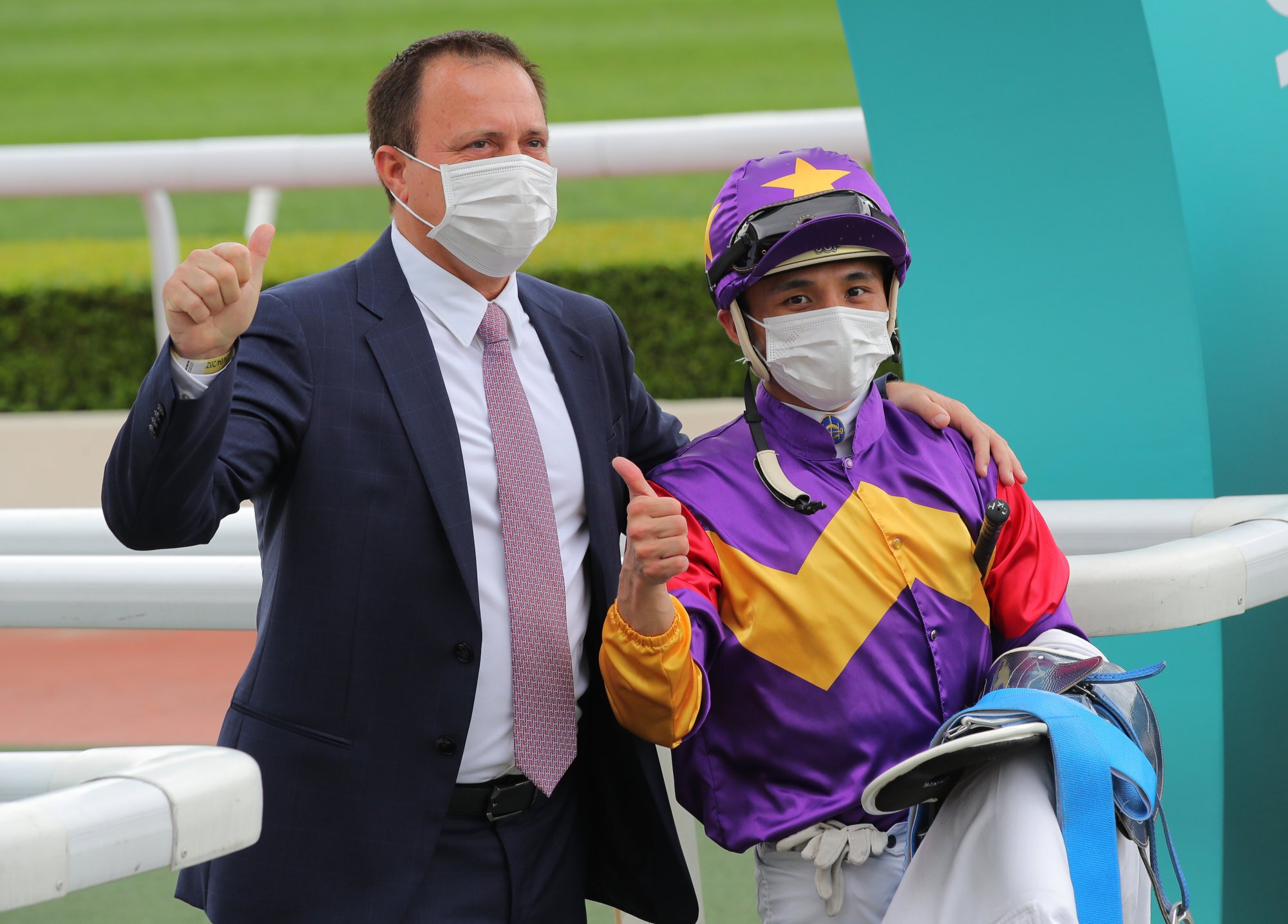 Trainer Caspar Fownes celebrates Lucky Quality’s victory with jockey Alfred Chan at Sha Tin on Sunday.