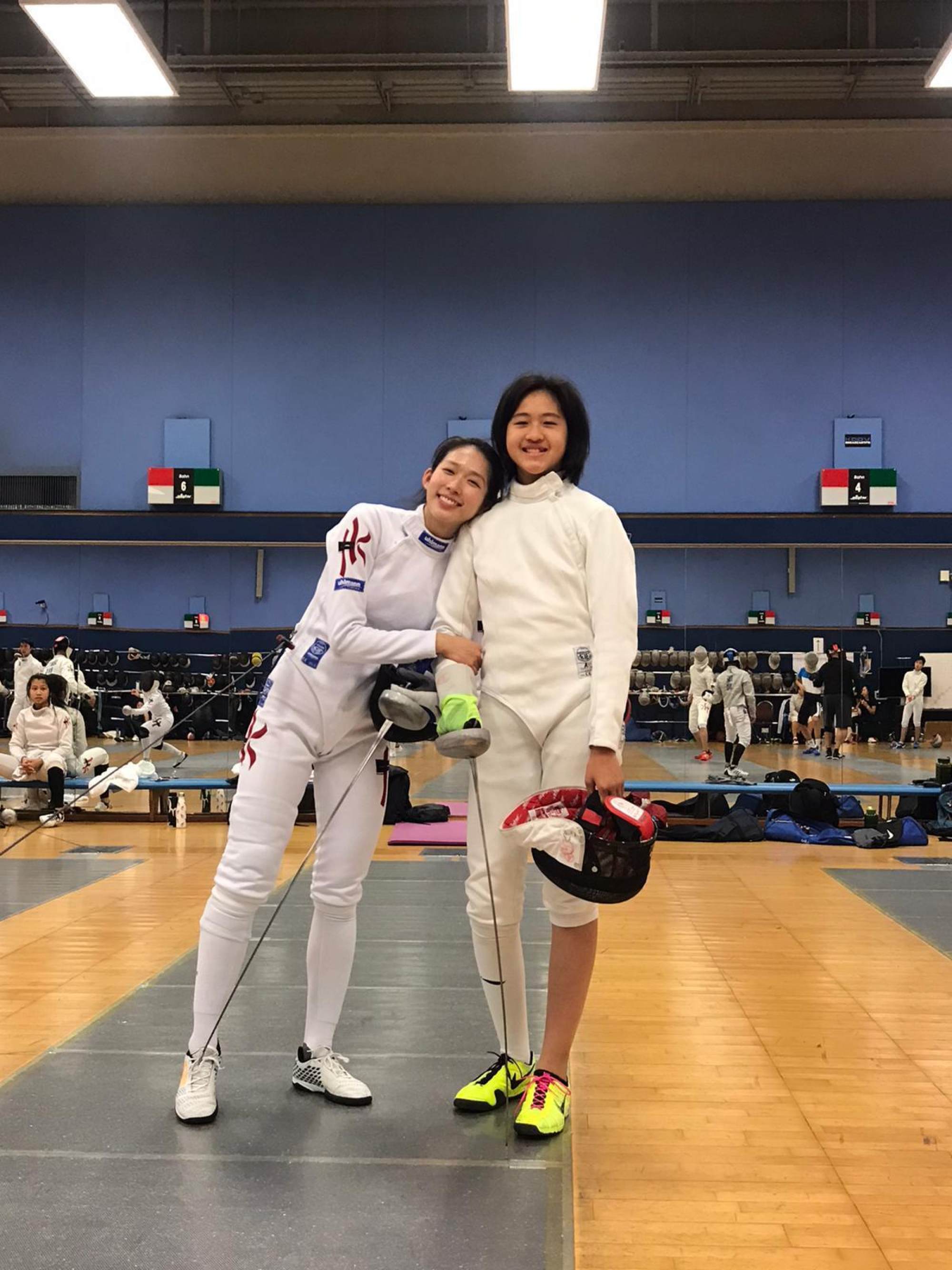 Fencer Vivian Kong Man-wai (left) is proud of ‘little sister’ Chen Hailin. Photo: Handout