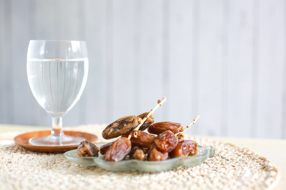 A glass of water and dates, a traditional way to break a Ramadan fast. Photo: Shutterstock