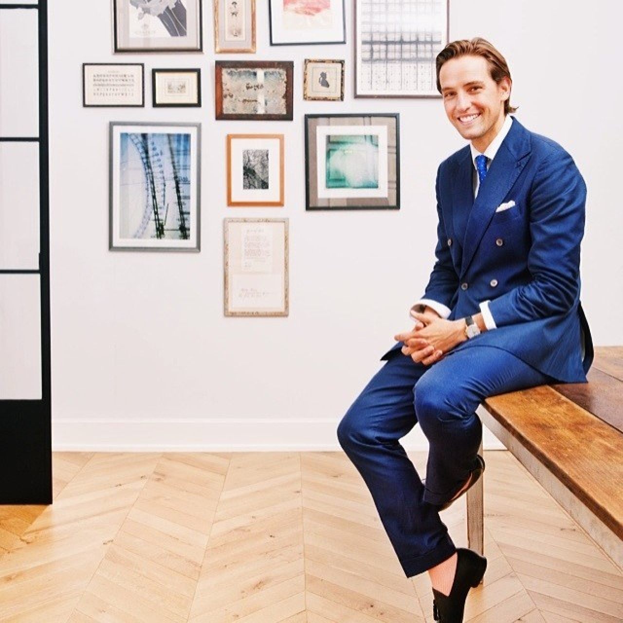 Alexander Gilkes started his art career as an auctioneer for Louis Vuitton. Photo: @miguelitomartin/Instagram