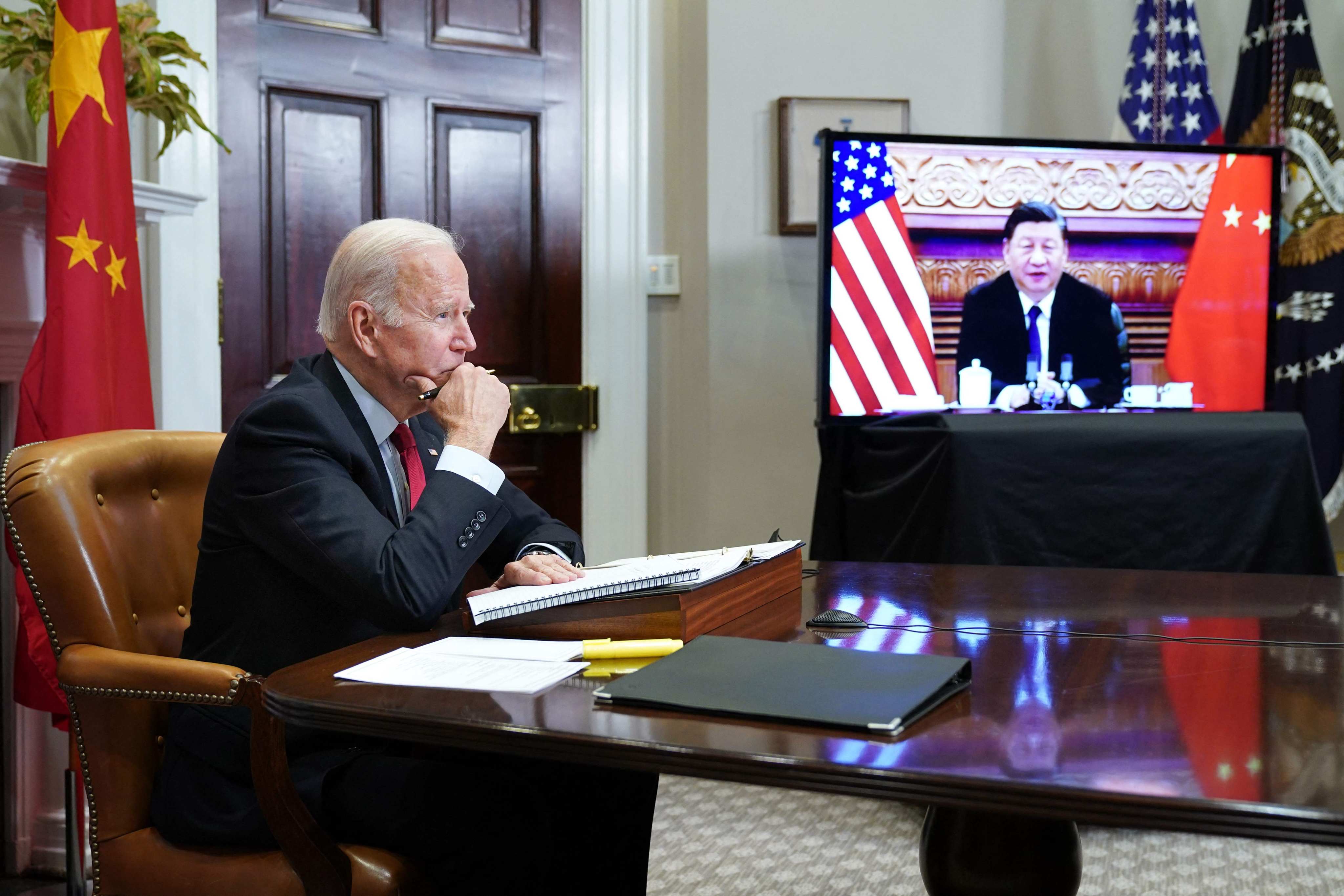 US President Joe Biden meets President Xi Jinping during a virtual summit from the Roosevelt Room of the White House in Washington on November 15, 2021. Photo: AFP