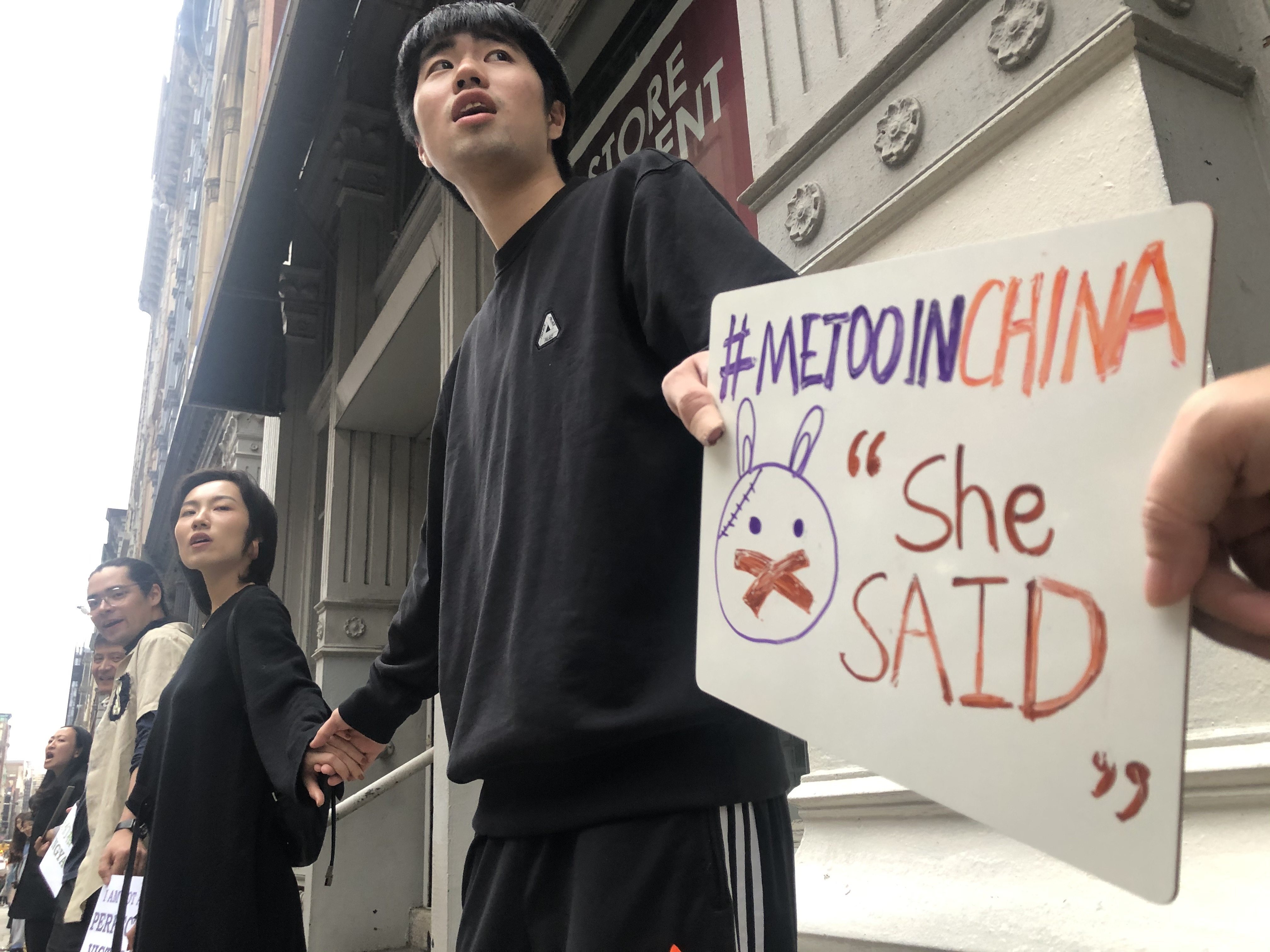 A human chain of protesters in support of the Chinese #MeToo movement. Photo: Xinyan Yu