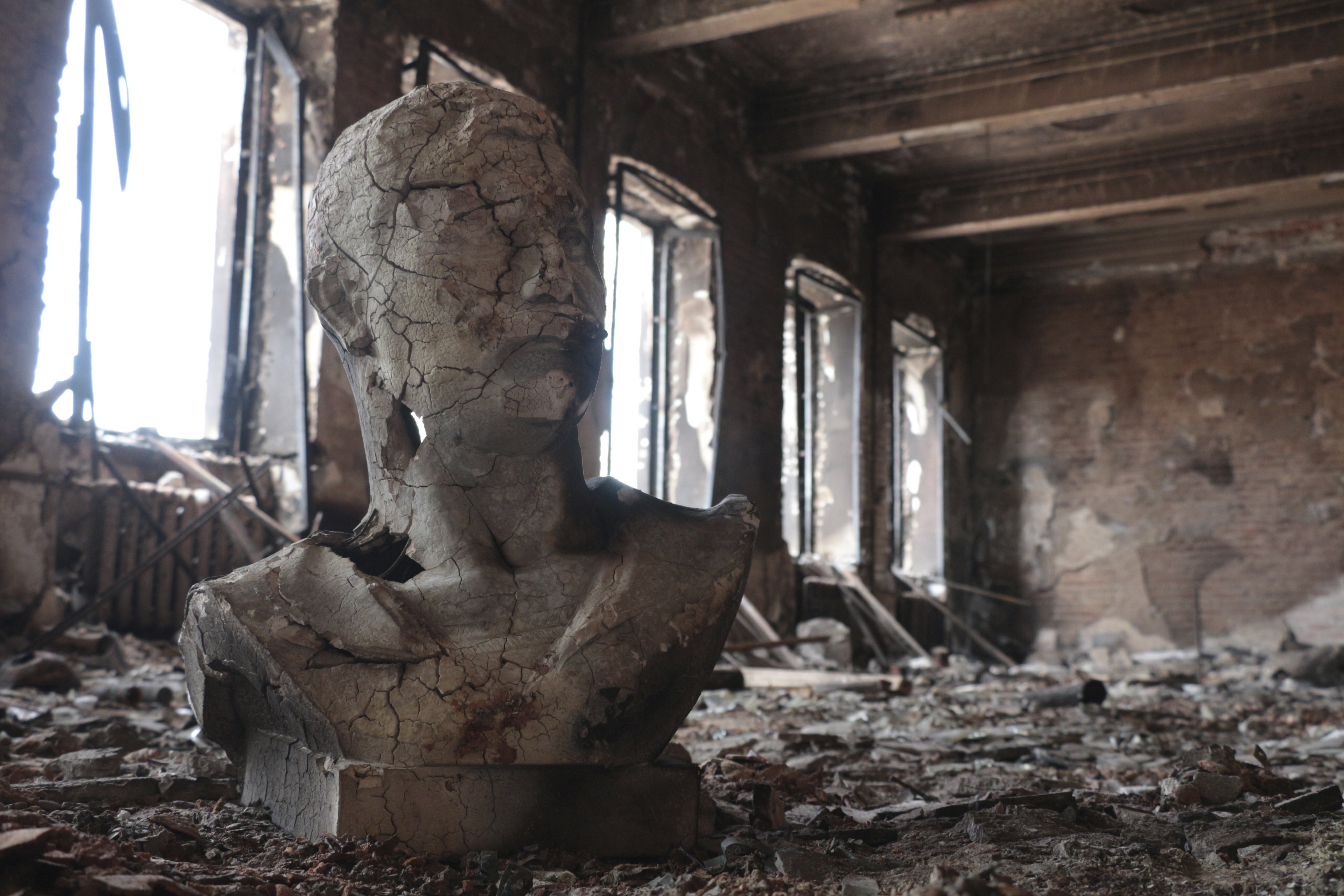 A destroyed bust can be seen in a hall at the Museum of Local Lore that burned down after shelling in an area controlled by Russian-backed separatist forces in Mariupol, eastern Ukraine, on April 28. Photo: AP