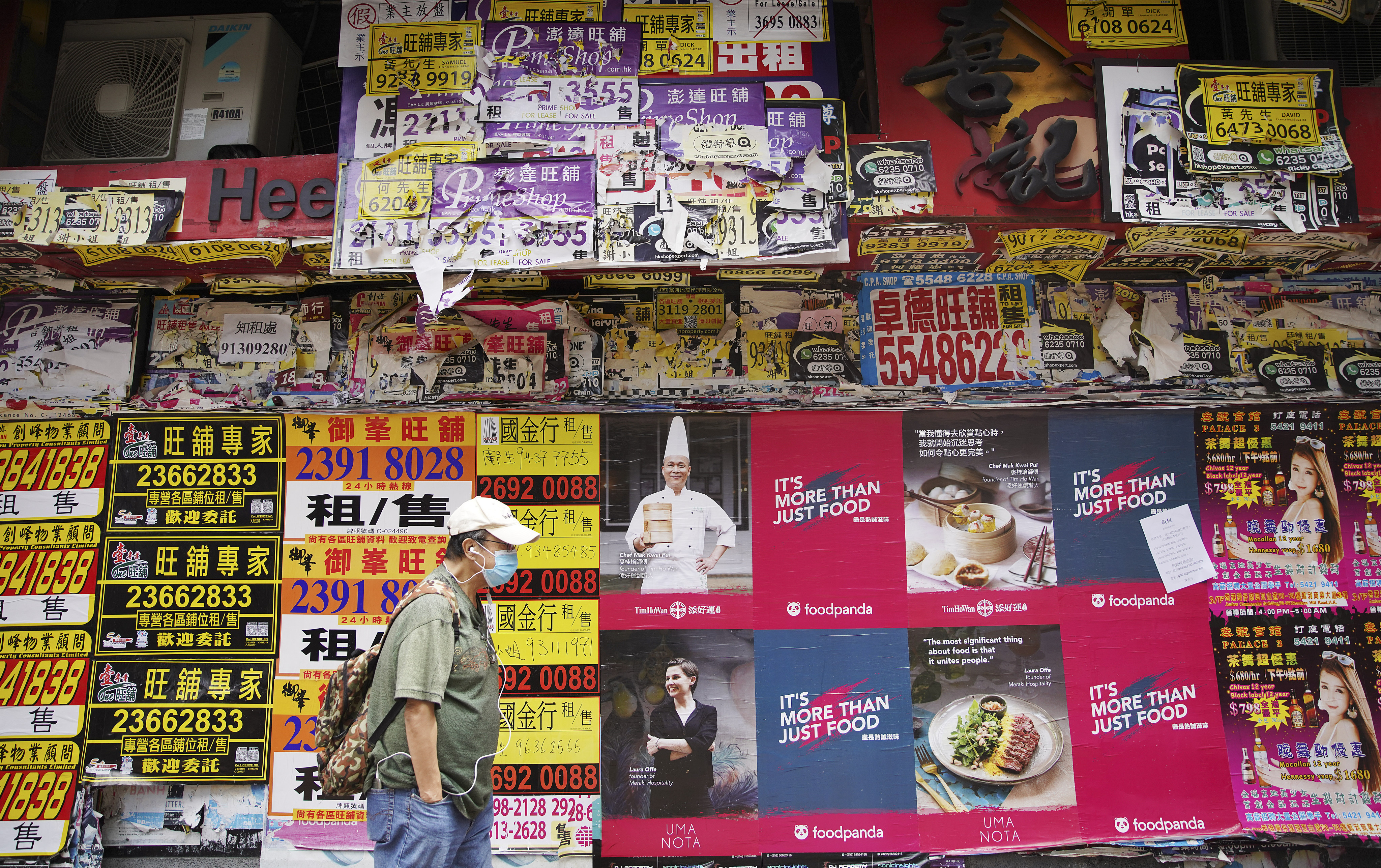 A man walked past a closed retail shop in Causeway Bay on 27 June 2020. Photo: Winson Wong
