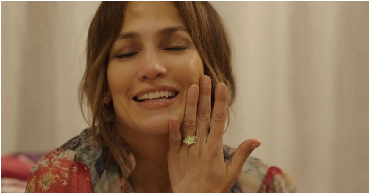 Jennifer Lopez wearing her green diamond engagement ring from Ben Affleck in April 2022. Her ring seems to be putting the spotlight on rare coloured diamonds.