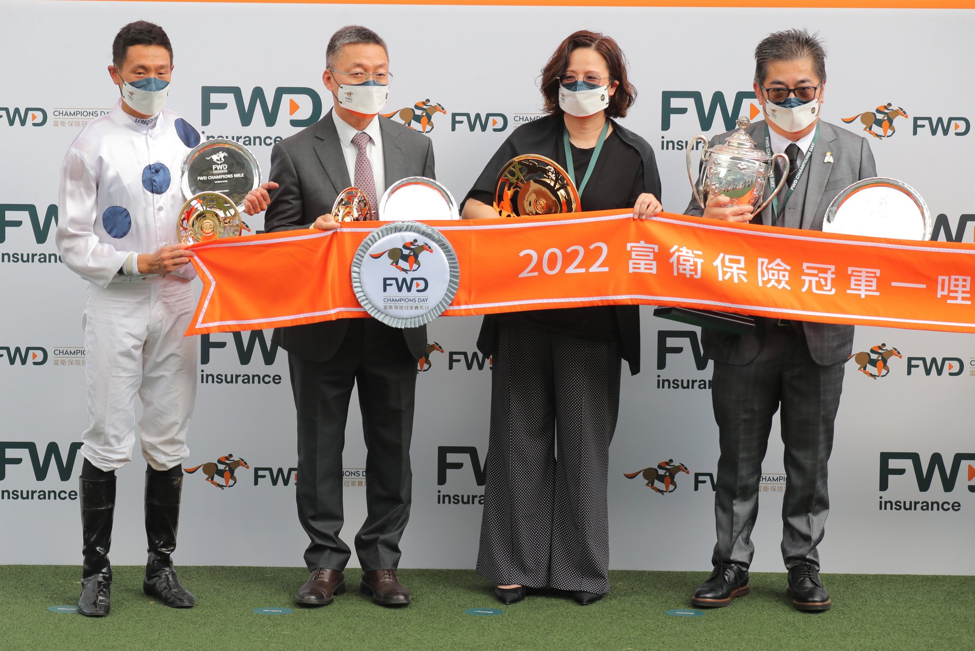 Golden Sixty’s jockey Vincent Ho (left), trainer Francis Lui (second from left) and owner Stanley Chan (right) celebrate their superstar’s win in last month’s Champions Mile.