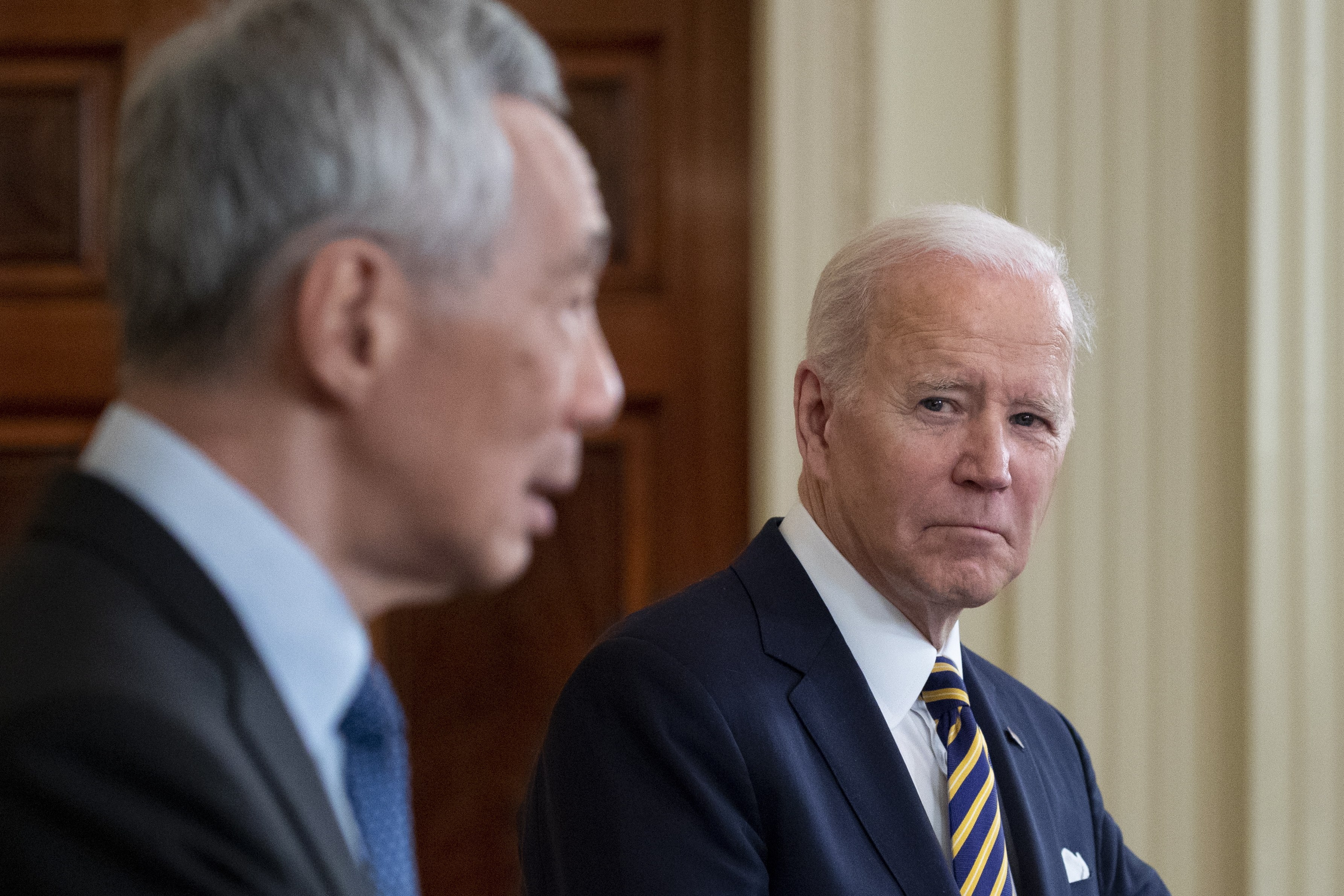 US President Joe Biden and Singapore Prime Minister Lee Hsien Loong at a joint press conference in Washington on March 29, 2022. Photo: EPA-EFE 