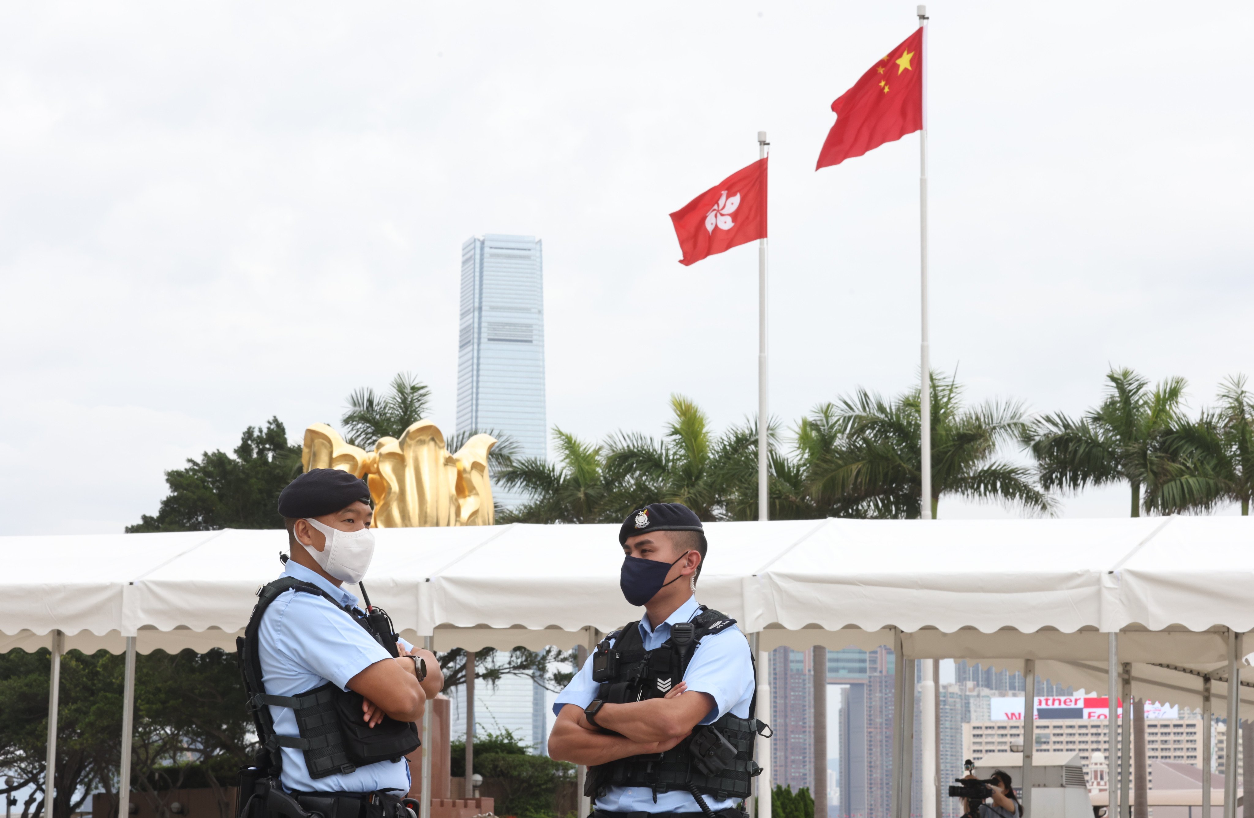 Police stand outside the Hong Kong Convention and Exhibition Centre in Wan Chai during the chief executive election on May 8. Photo: K. Y. Cheng