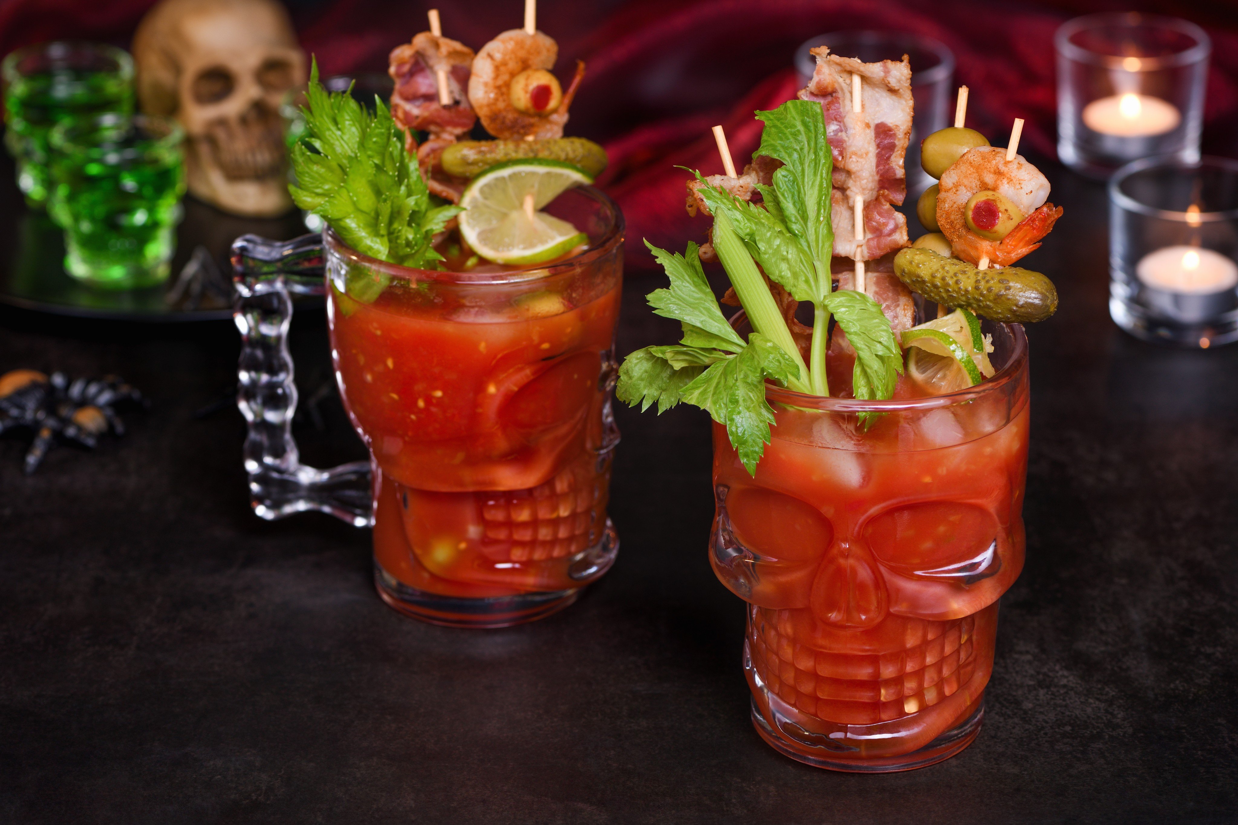 Creepy Halloween party - Caesar or Bloody Mary cocktail containing vodka, some tomato juice, different spices and flavorings, such as Worcestershire sauce, celery. Served with ice in a beer glass