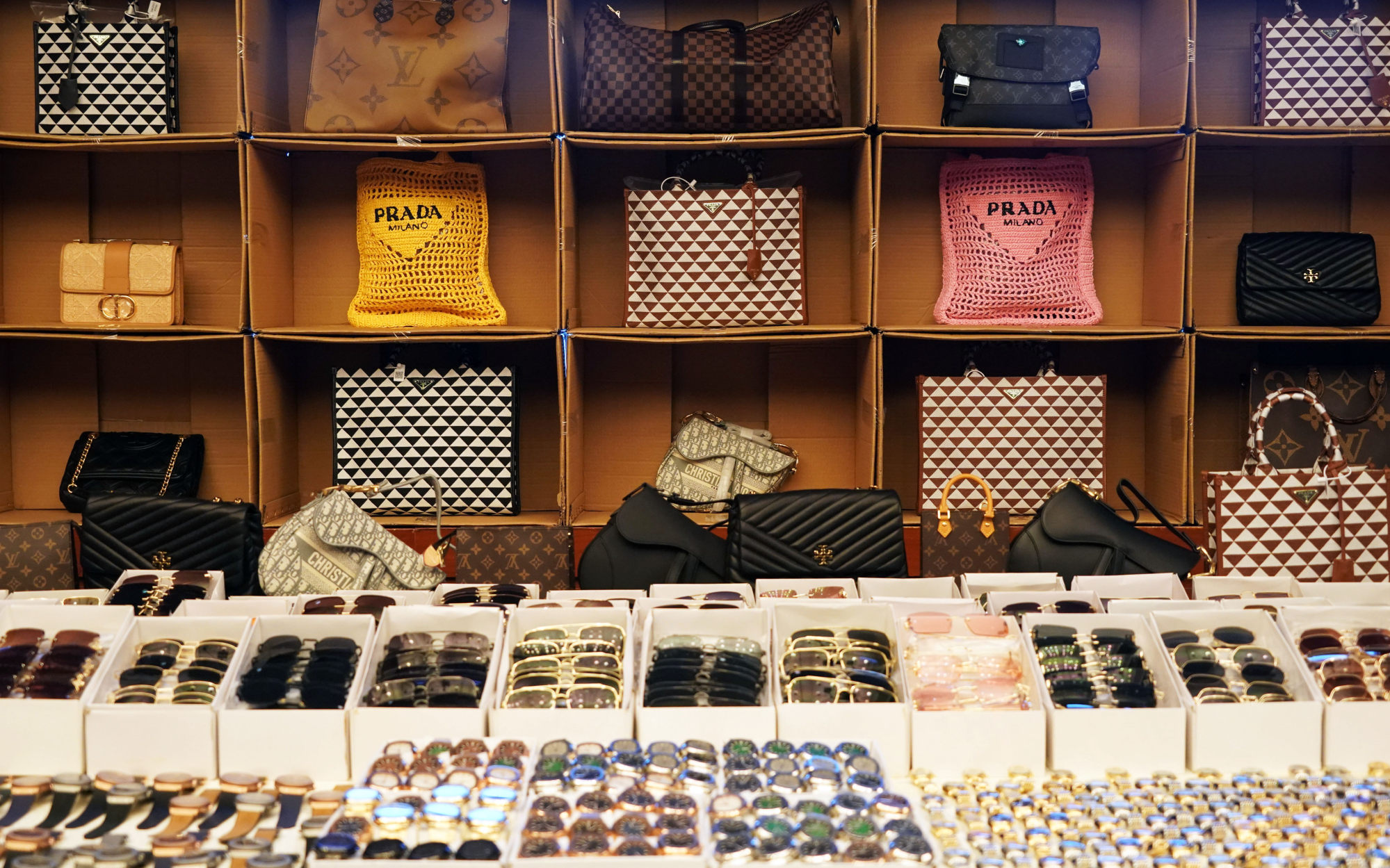 Knock-off handbags and sunglasses with high-end labels were also seized. Photo: Felix Wong