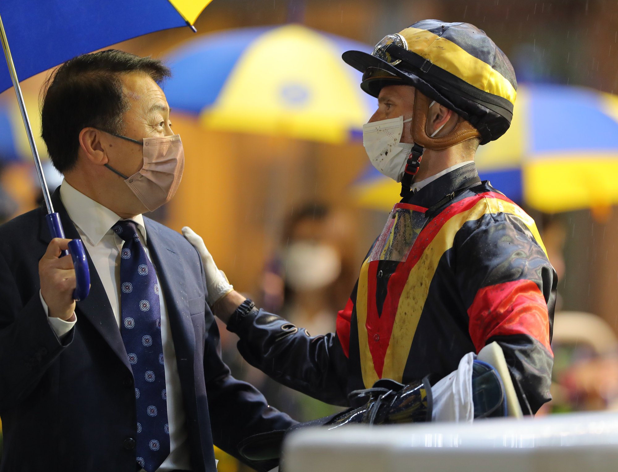 Trainer Ricky Yiu and jockey Lyle Hewitson celebrate Nimble Nimbus’ victory at Happy Valley on Wednesday night. Photo: Kenneth Chan