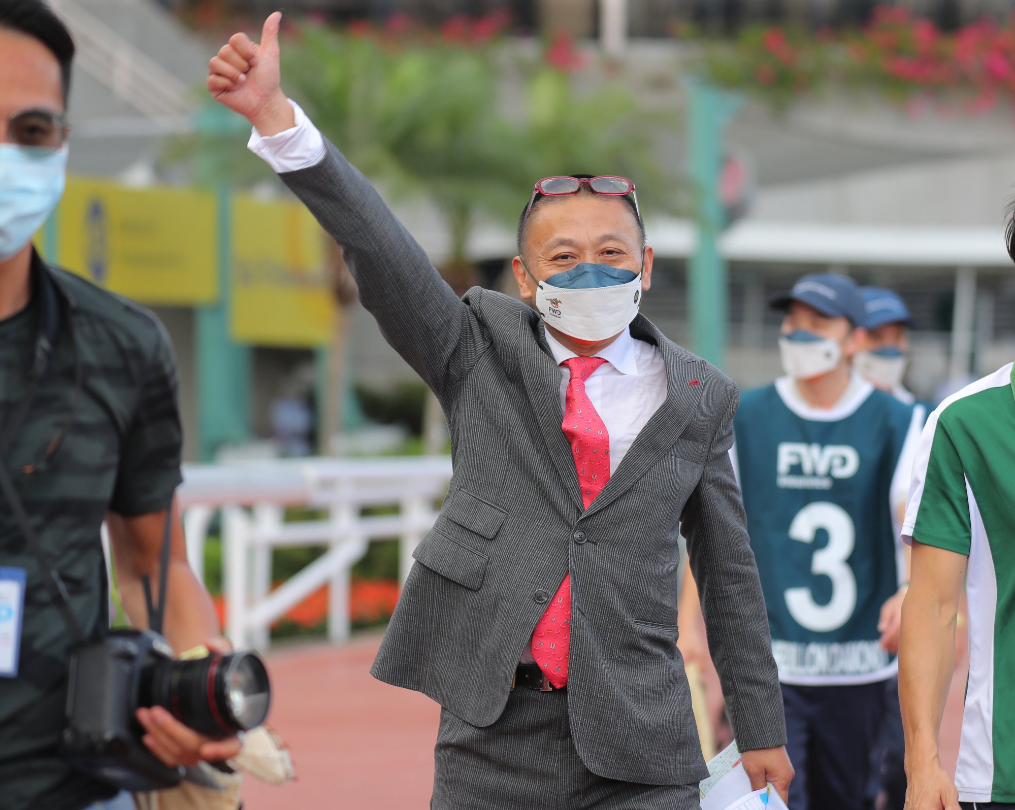 Danny Shum celebrates Romantic Warrior’s victory in the Derby. Photo: HKJC