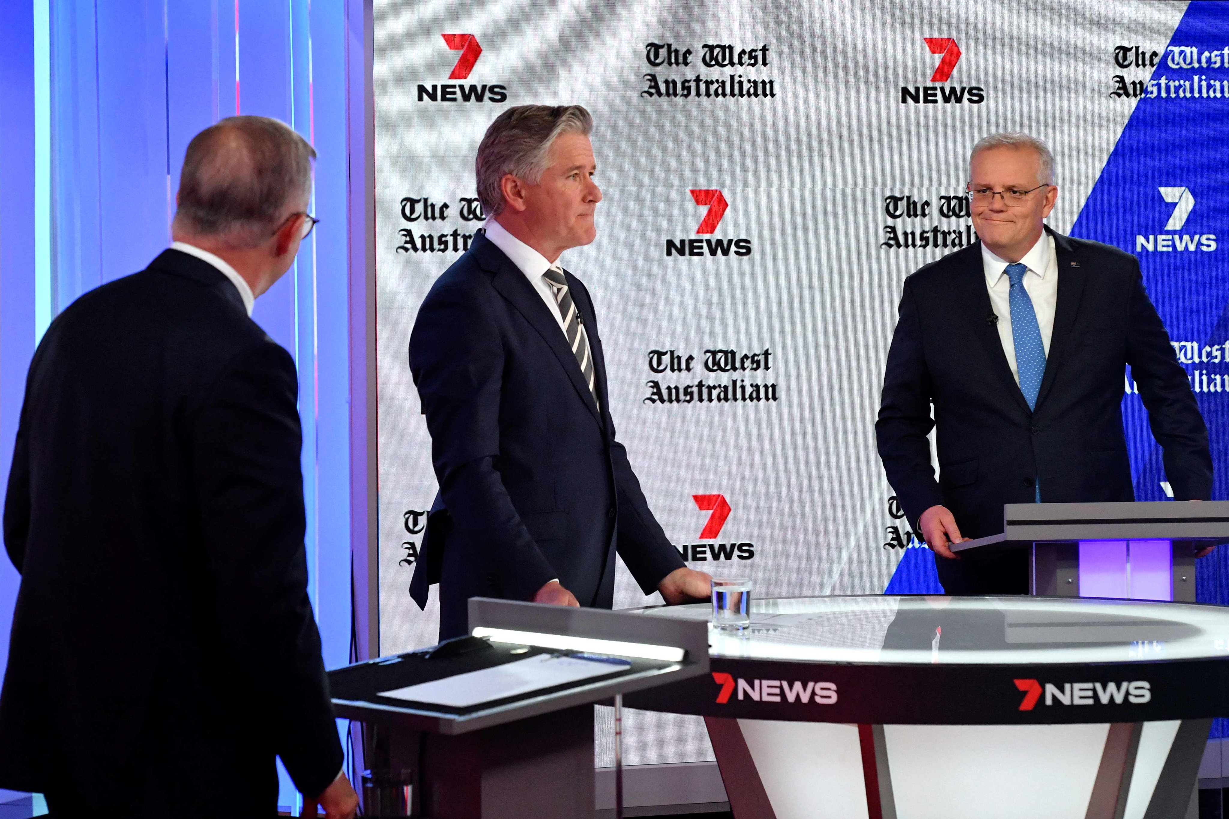 Australian Prime Minister Scott Morrison (right) and Opposition Leader, Anthony Albanese, attend the third leaders’ debate of the 2022 federal election campaign  in Sydney on Wednesday. Photo: AFP