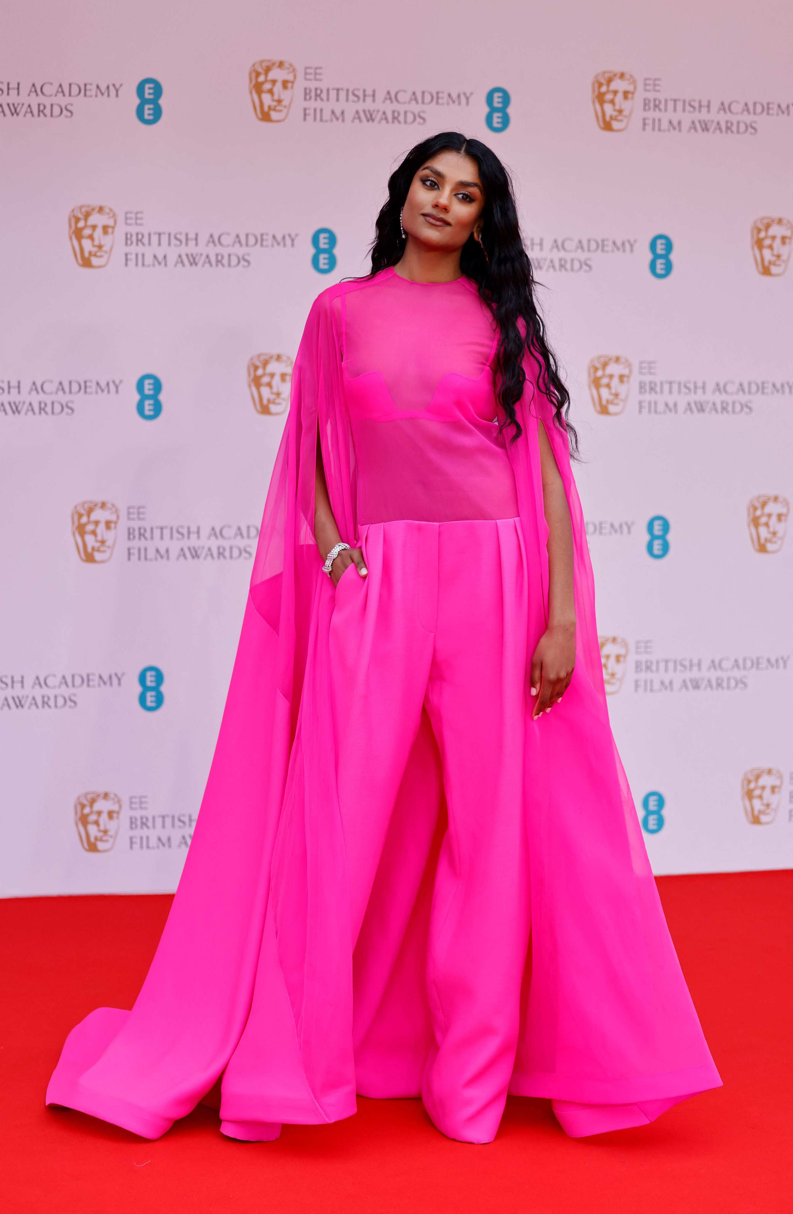 How to get British actress Simone Ashley’s all-pink Pierpaolo Piccioli and Valentino Baftas red carpet look. Photo: AFP
