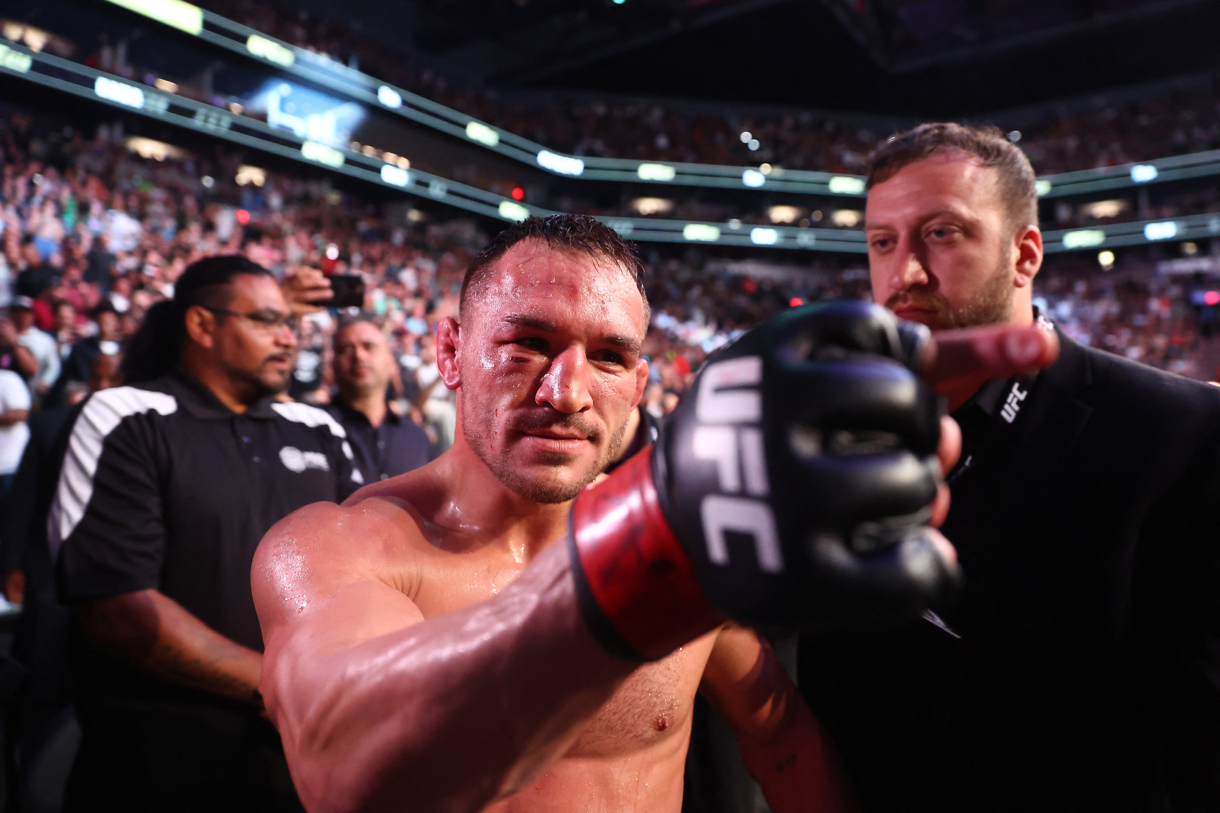 Michael Chandler celebrates his knockout victory against Tony Ferguson at UFC 274. Photo: USA TODAY Sports