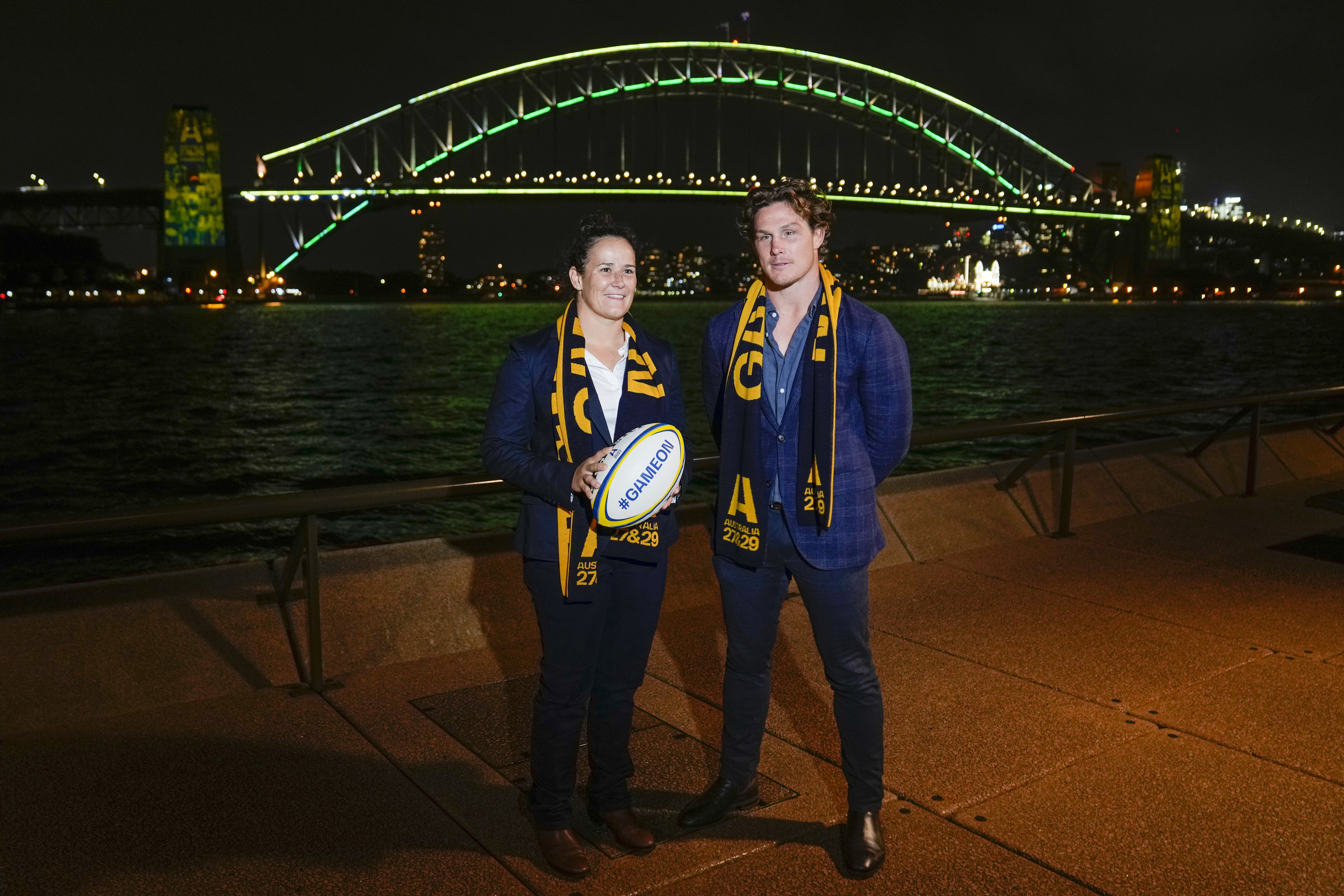 Wallaroos captain Shannon Parry with Wallabies captain Michael Hooper as Australia are confirmed as host for the men’s and women’s World Cups. Photo: AP