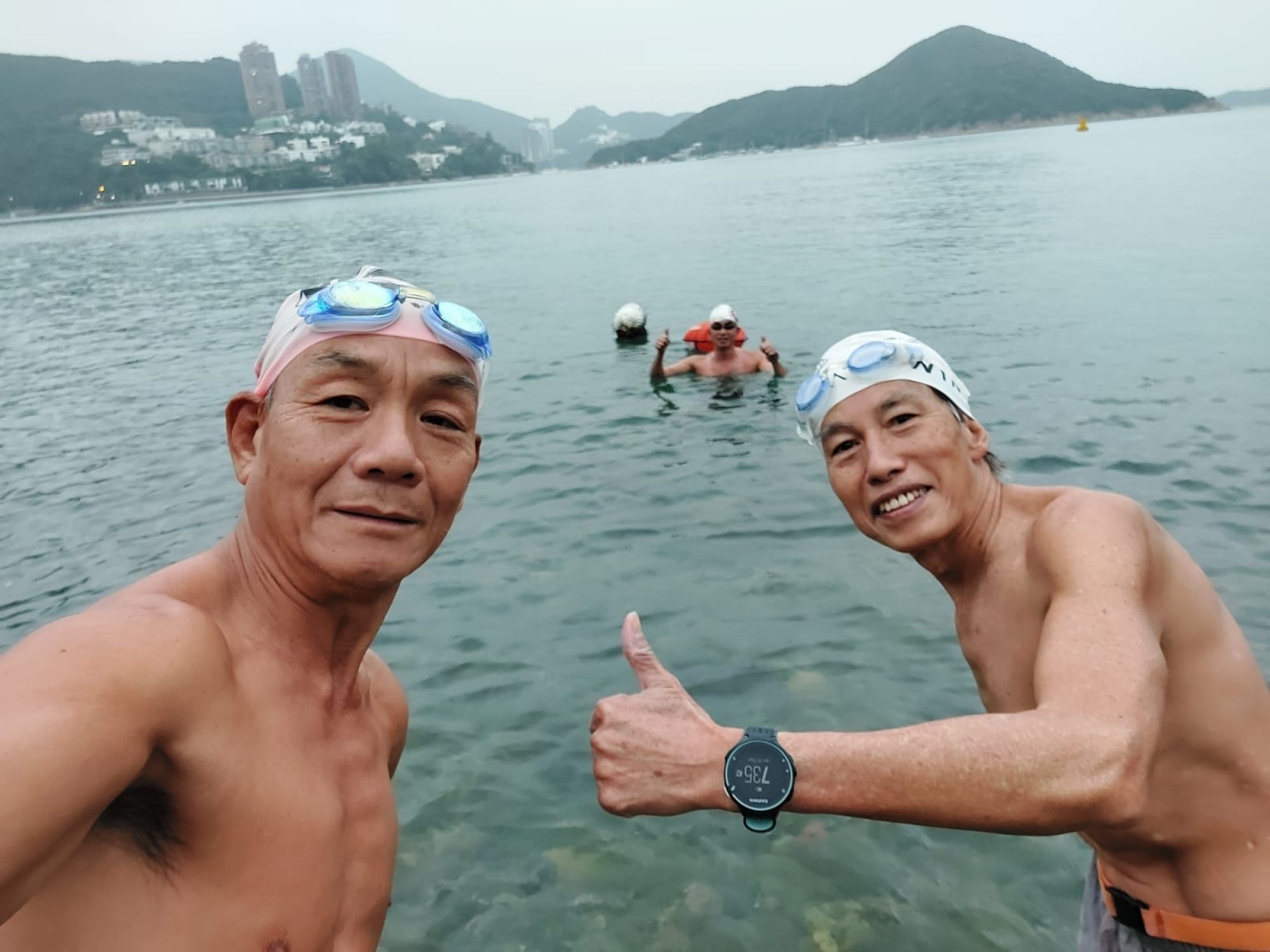 Most mornings, Tsoi (left) swims in the sea. Photo: Tsoi Wing-cheung
