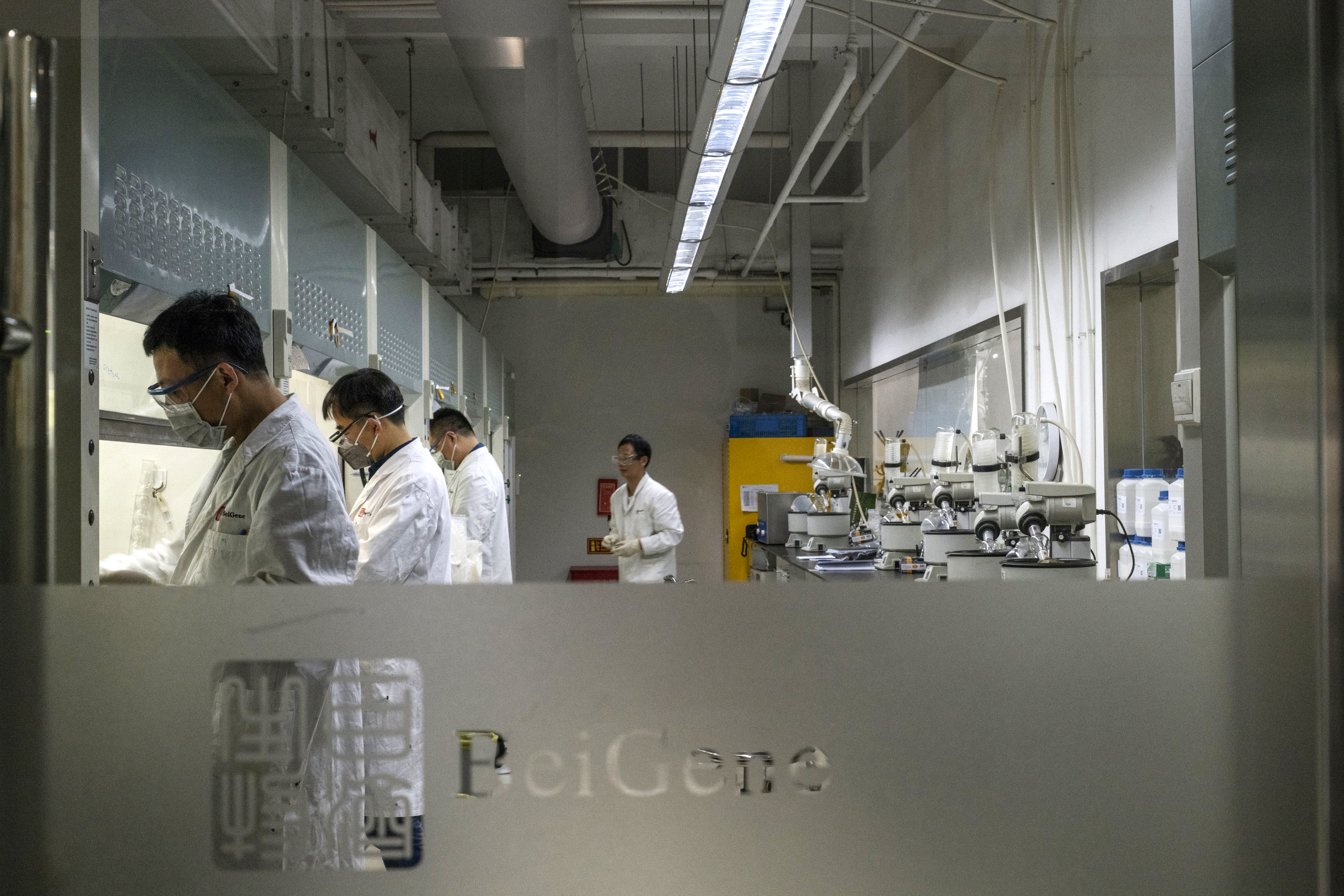 Researchers work inside a laboratory at BeiGene’s research and development center in Beijing. Temasek has increased its holdings in the biotech company. Photo: Bloomberg
