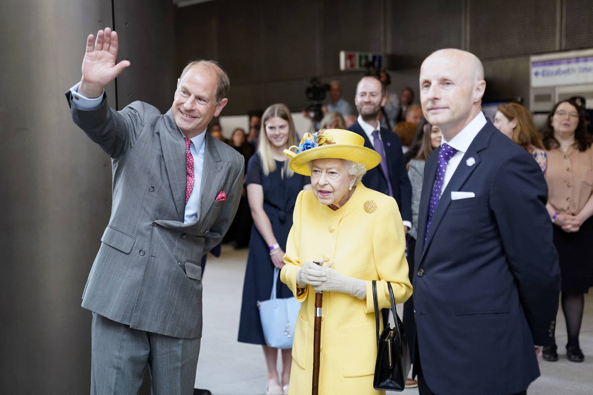 Britain’s Prince Edward, left, and Queen Elizabeth meet staff at Paddington Station in London on Tuesday. Photo: AFP
