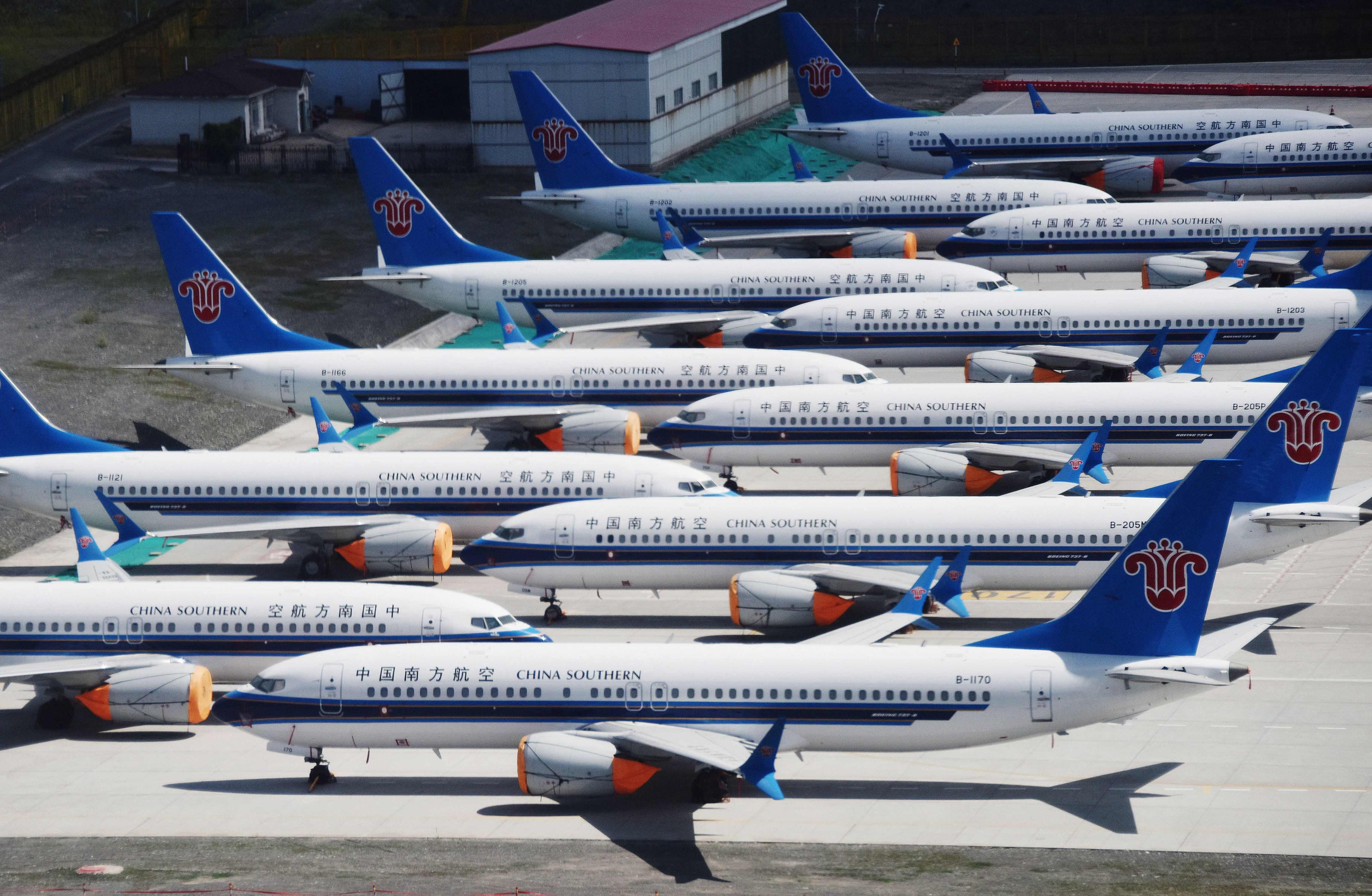 A fleet of Boeing 737 MAX aircraft bearing the livery of China Southern Airlines parked at Urumqi airport in western China’s Xinjiang regionon June 5, 2019. Photo: AFP