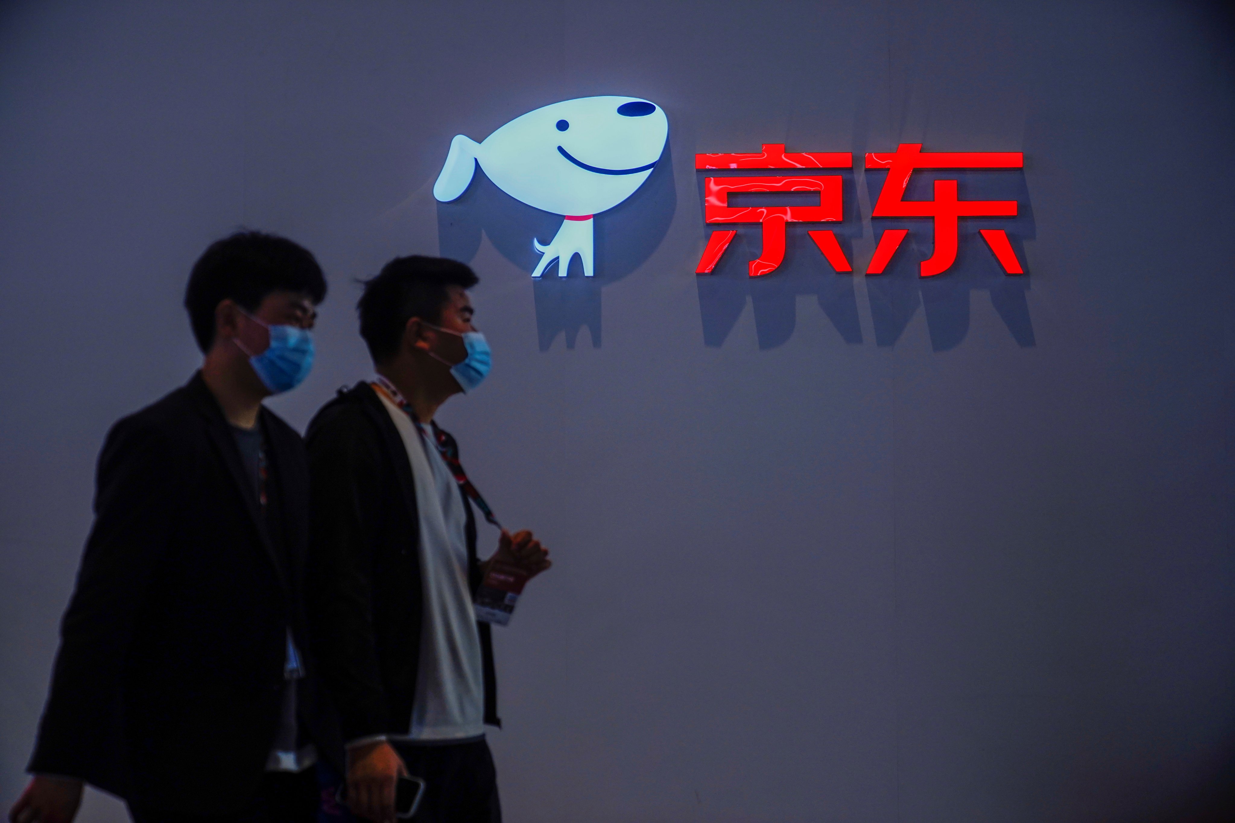 A JD.com company sign seen at the Appliance and Electronics World Expo in Shanghai on March 23, 2021.  Photo: Reuters