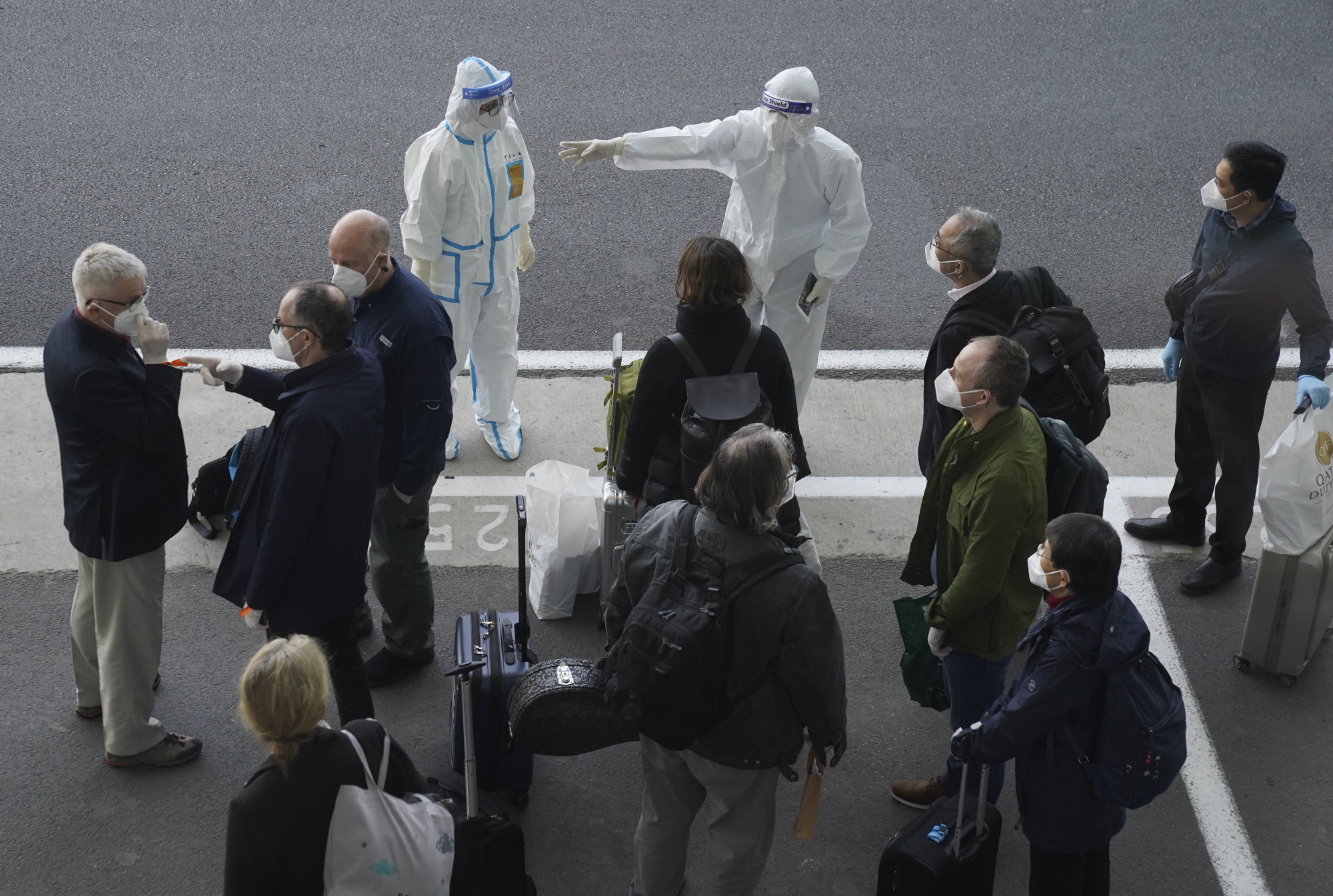 A WHO team probing Covid-19 origins arrives in the Chinese city of Wuhan in January 2021. Photo: AP