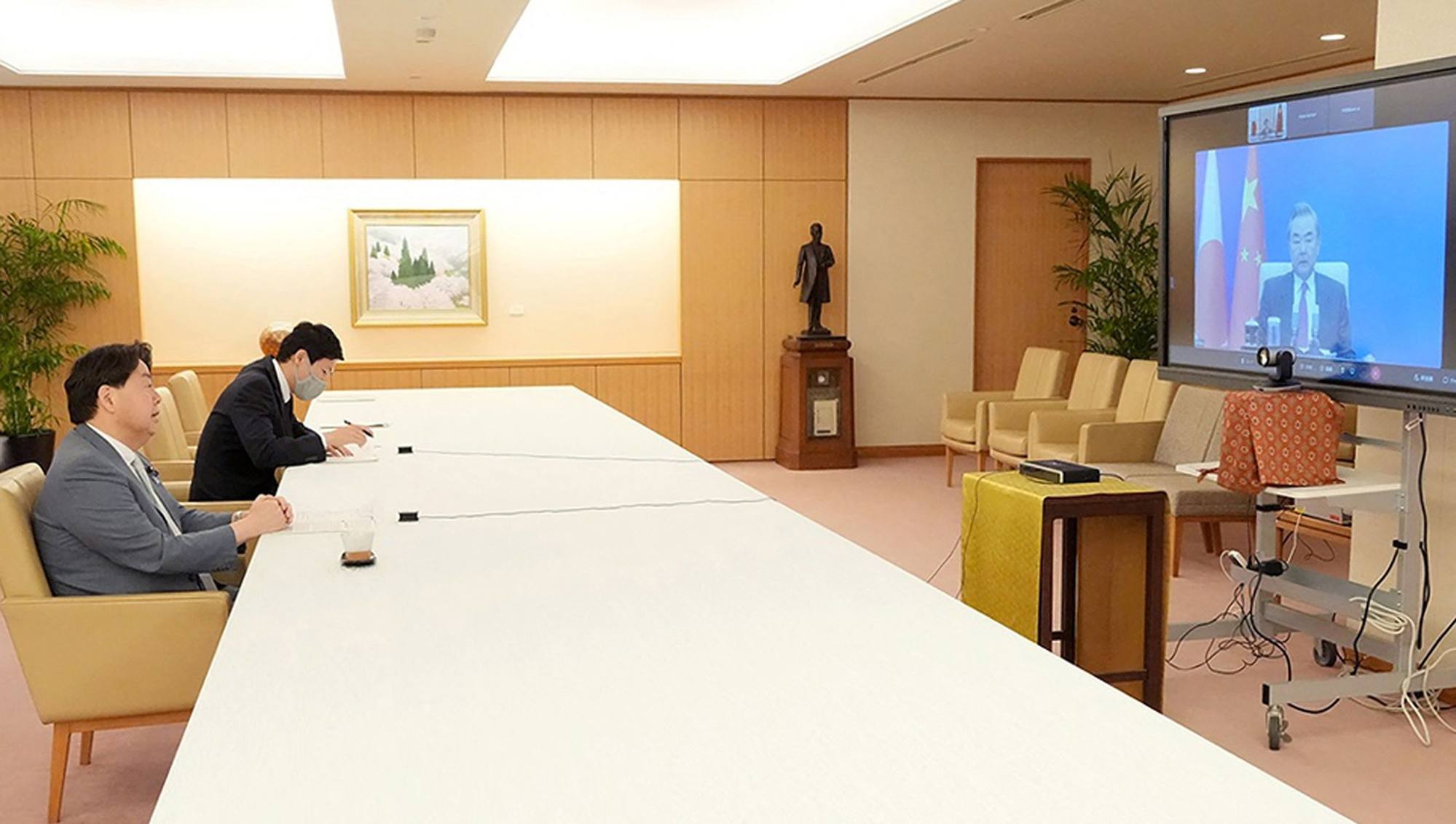 Japan’s Foreign Minister Yoshimasa Hayashi (left) speaks with his Chinese counterpart Wang Yi. Photo: AFP