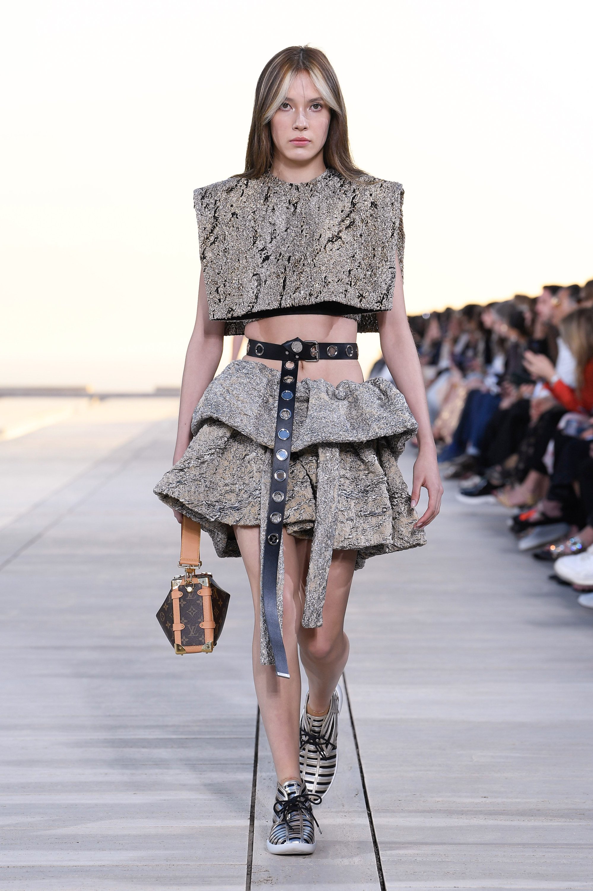 A model walks the runway during Louis Vuitton 2019 Cruise