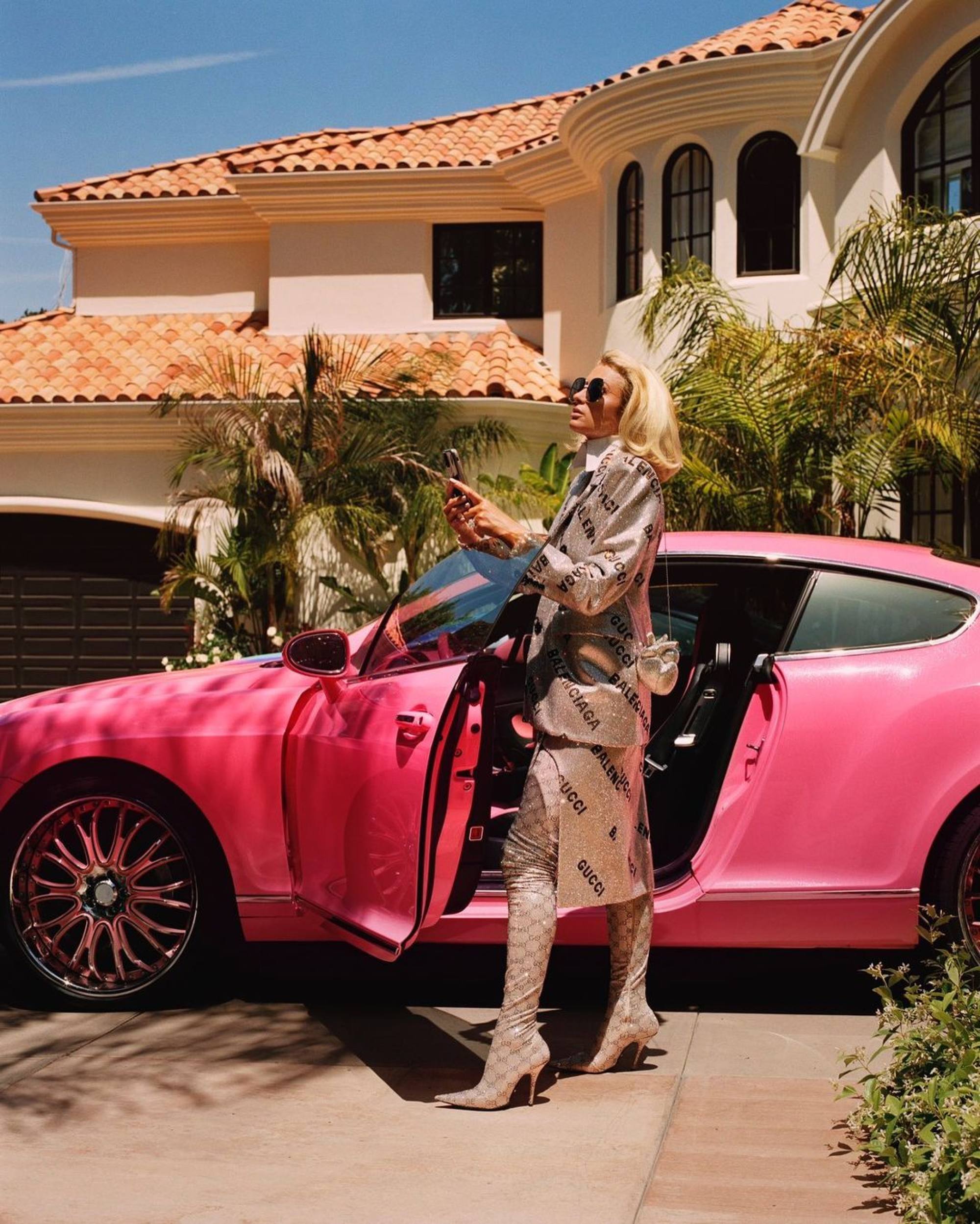 EXCLUSIVE!! Paris Hilton drives out of her gated community, the first  pictures of Hilton since