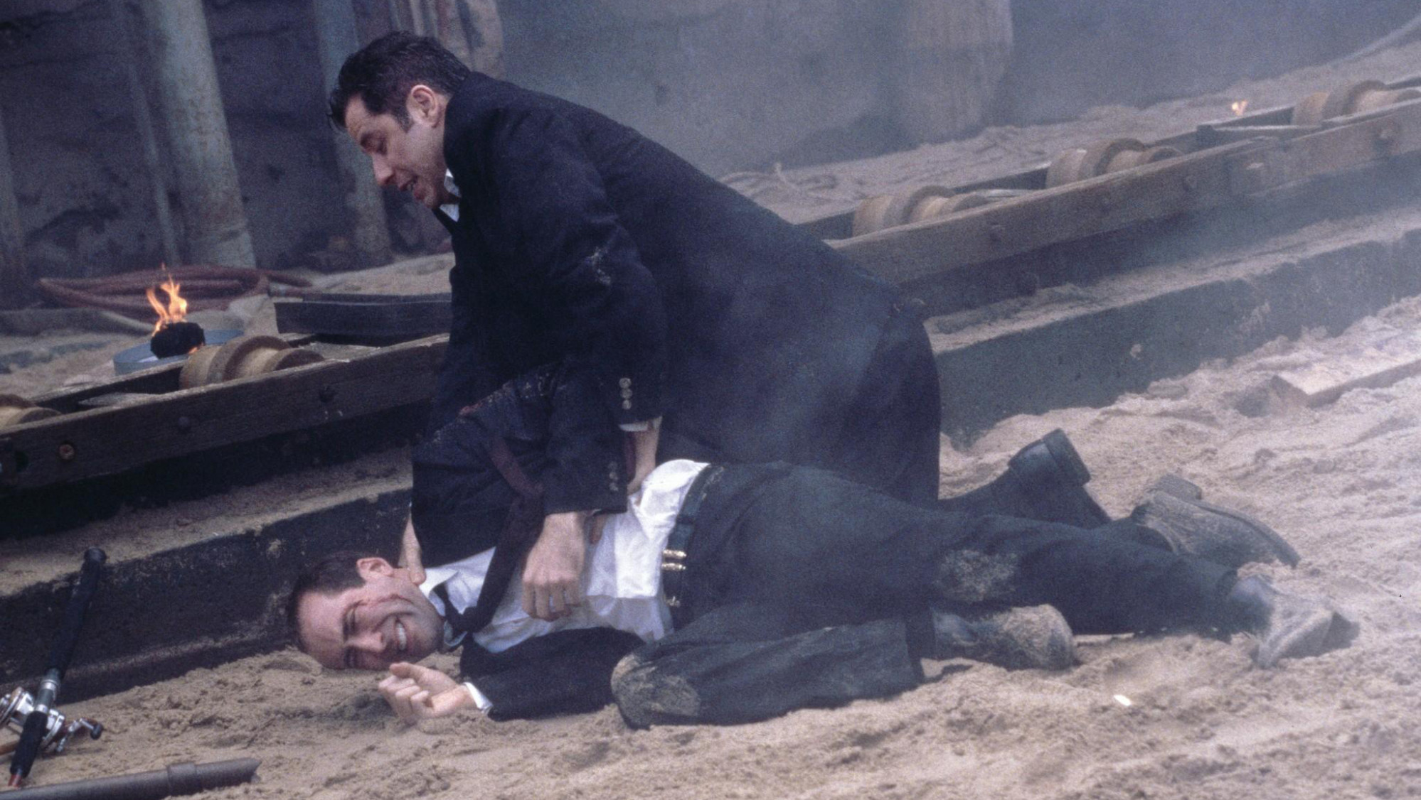 John Travolta (top) and Nicolas Cage in a still from Face/Off.