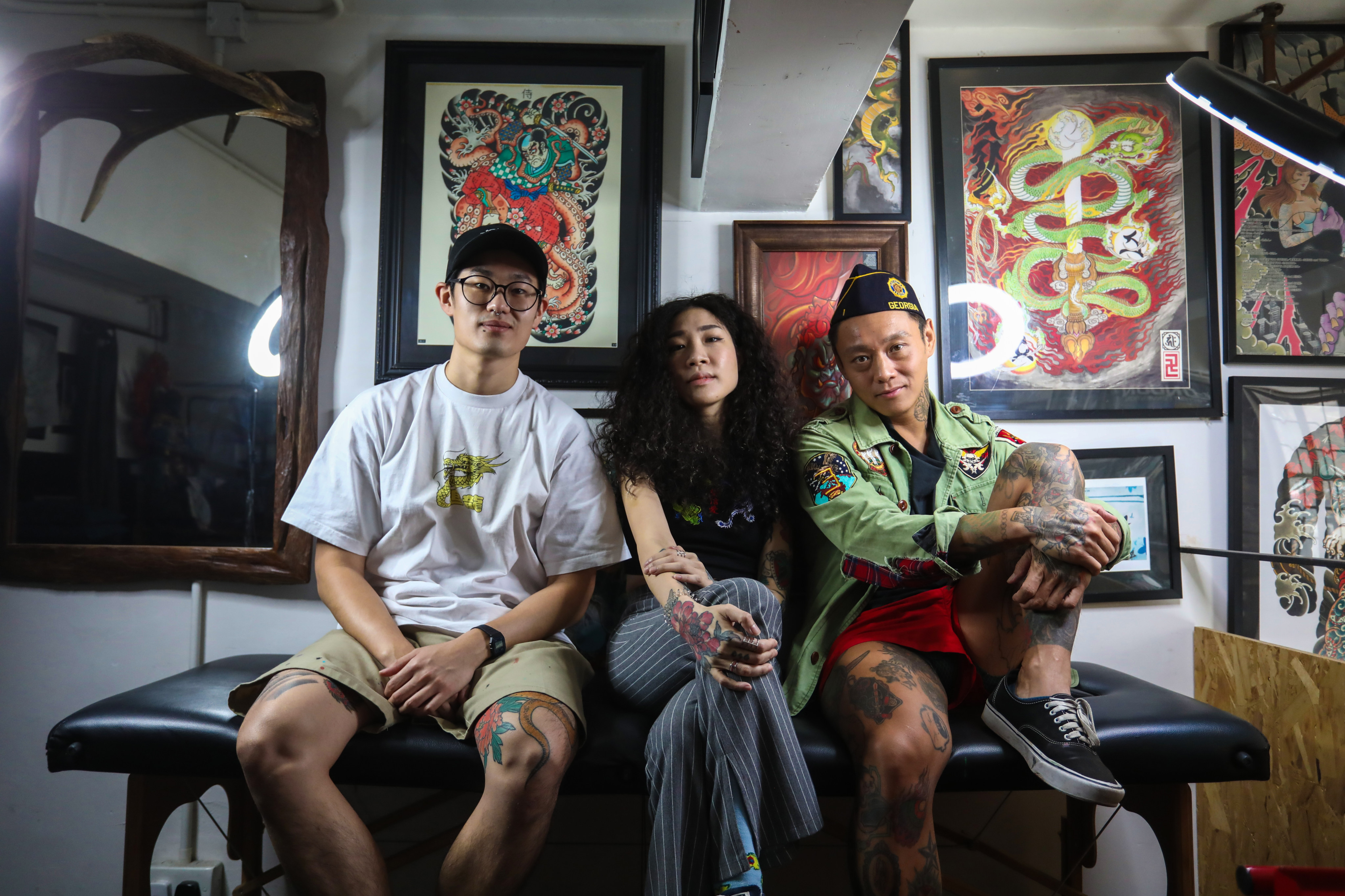 Galaxy Tattoo members at their shop in Sai Ying Pun. Photo: Jonathan Wong