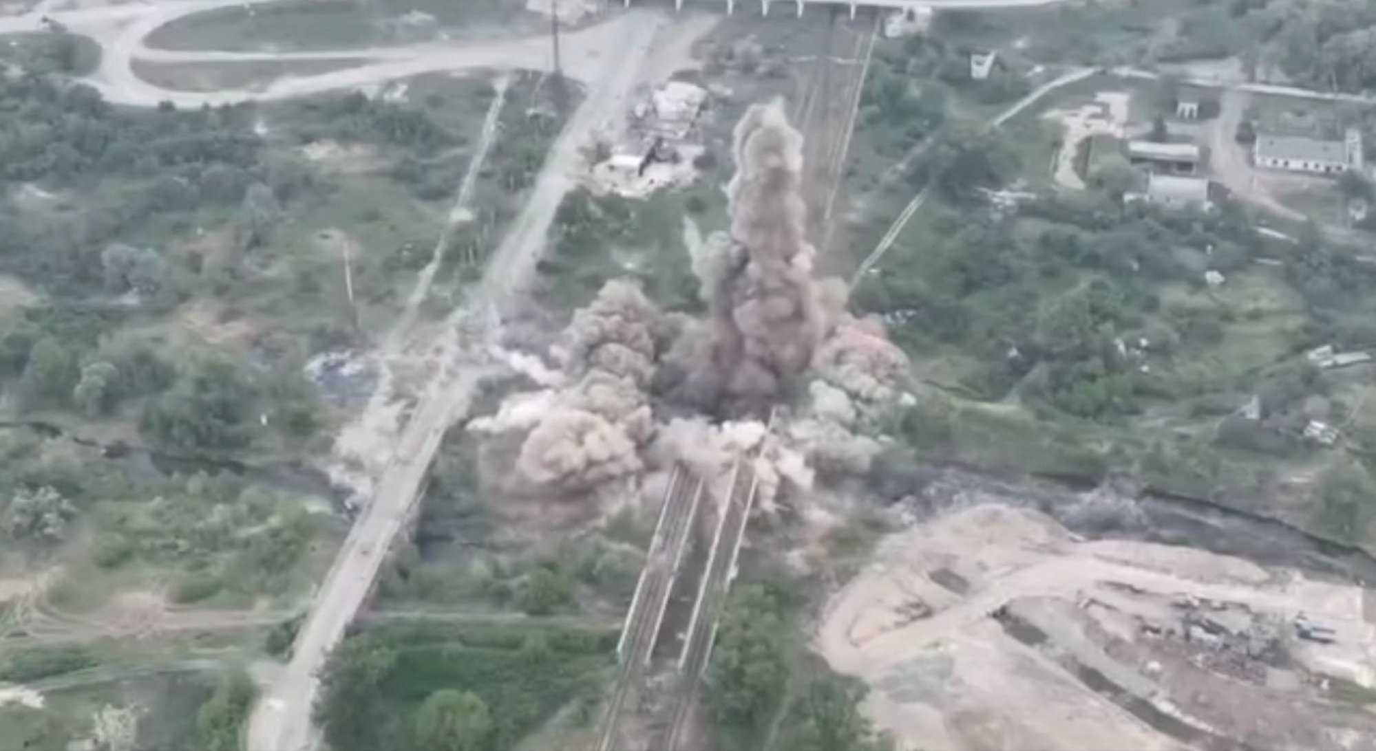View of an explosion after a joint operation of members of the National Guard of Ukraine, Special Operations Forces and State Security Service to blow up a bridge connecting Sievierodonetsk and Lysychansk to Rubizhne. Ukraine National Guard/Handout via Reuters