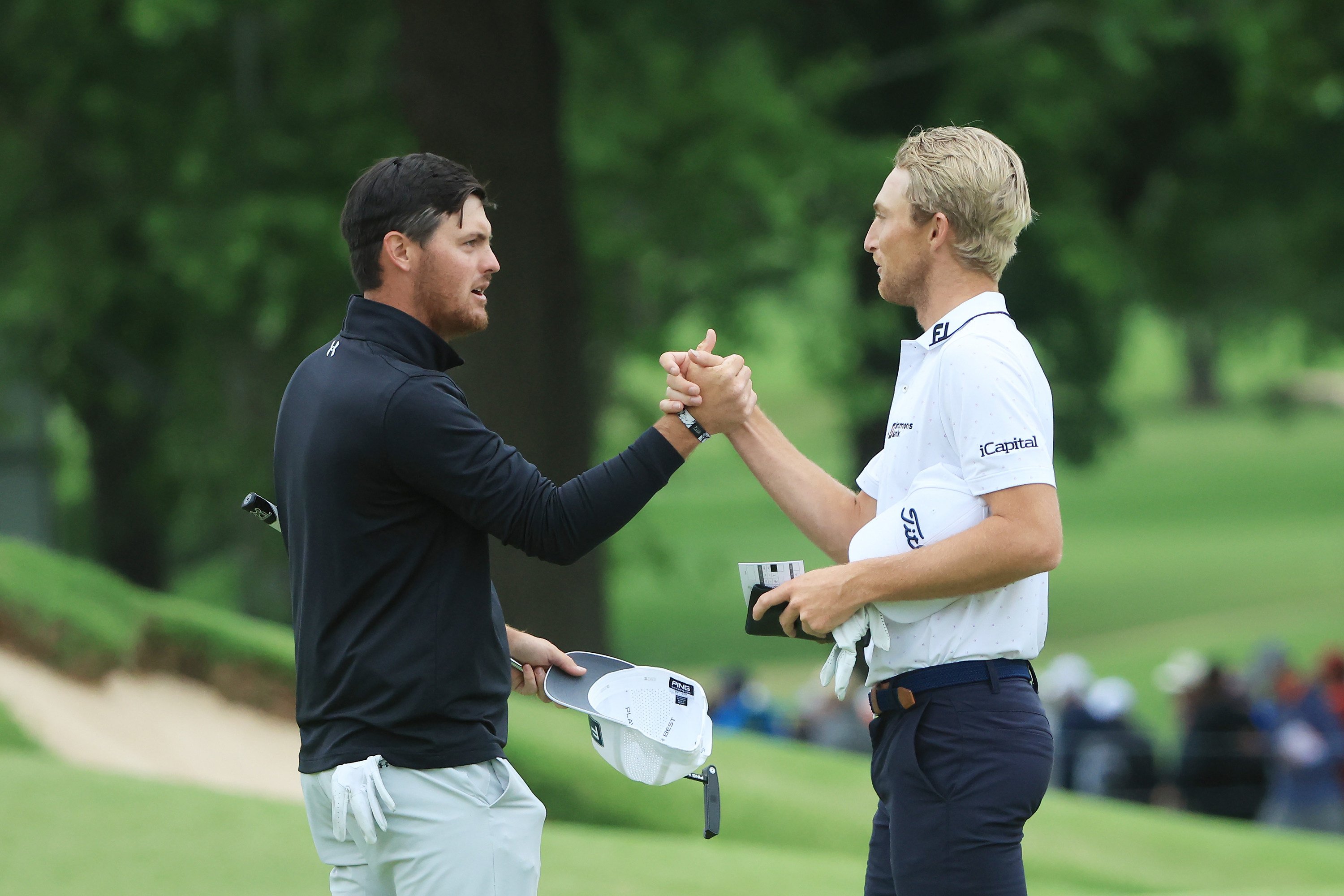 Chile’s Mito Pereira (left) and Will Zalatoris shake hands on the 18th green after the the third round of the PGA Championship. Photo: TNS