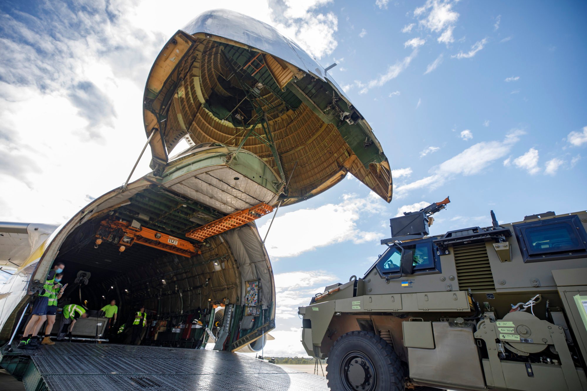 An Australian Government-donated Bushmaster protected mobility vehicle bound for Ukraine is loaded onto an Antonov AN-124 cargo aircraft at RAAF Base Amberley in Queensland on May 4. Photo: Australian Government Department of Defence via dpa