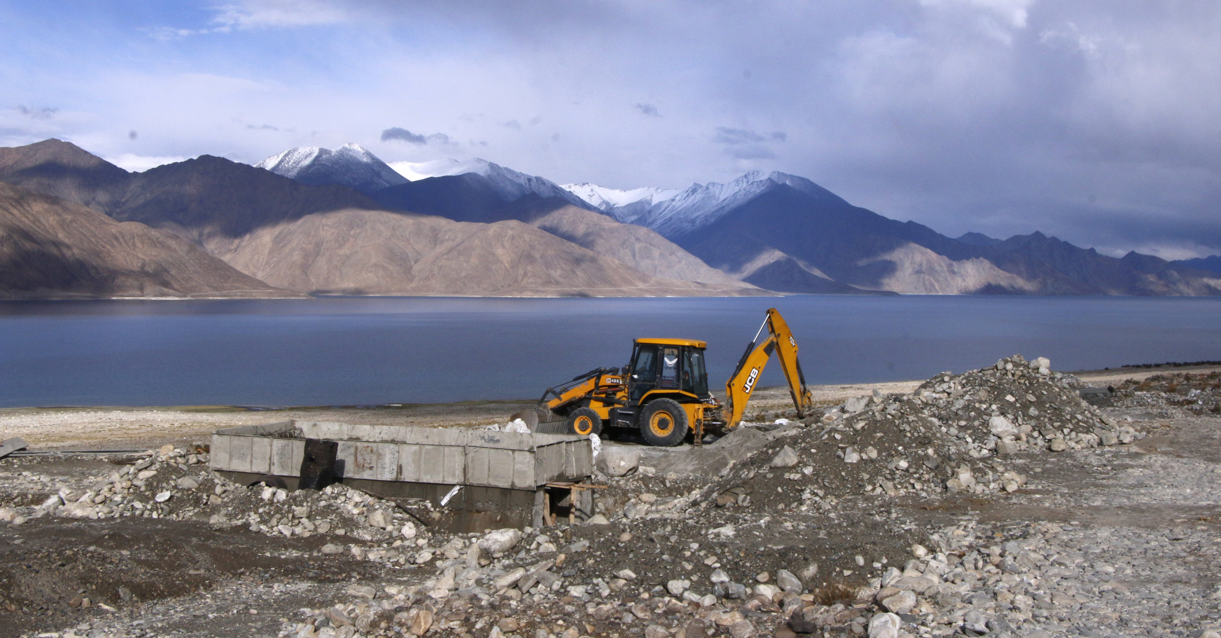 A bulldozer working on a road near Pangong Tso lake in the Himalayas. Photo: Kamran Yousuf
