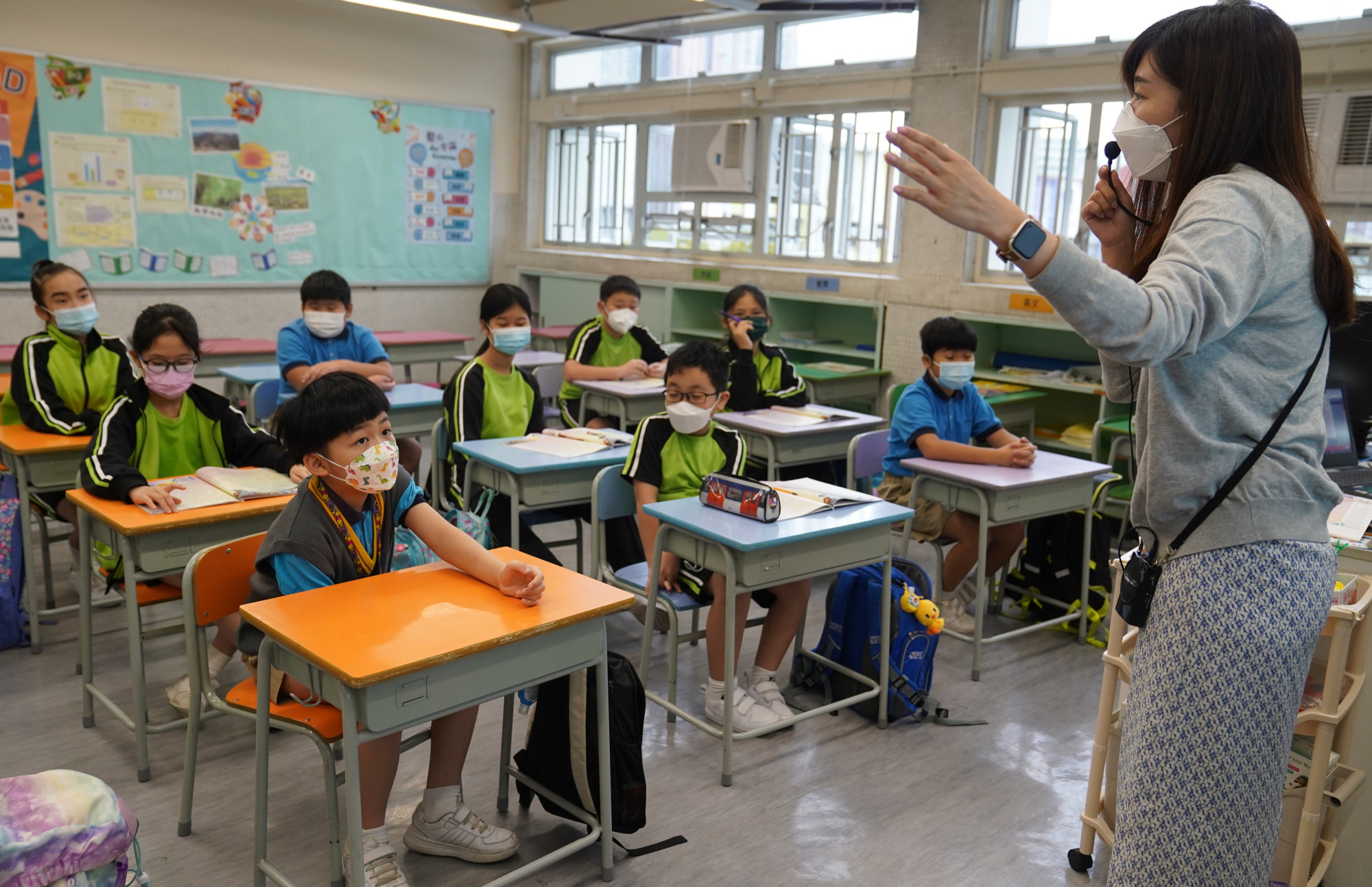 A teacher gives a lesson in a traditional classroom setting at a primary school in Tsing Yi. Photo: Sam Tsang