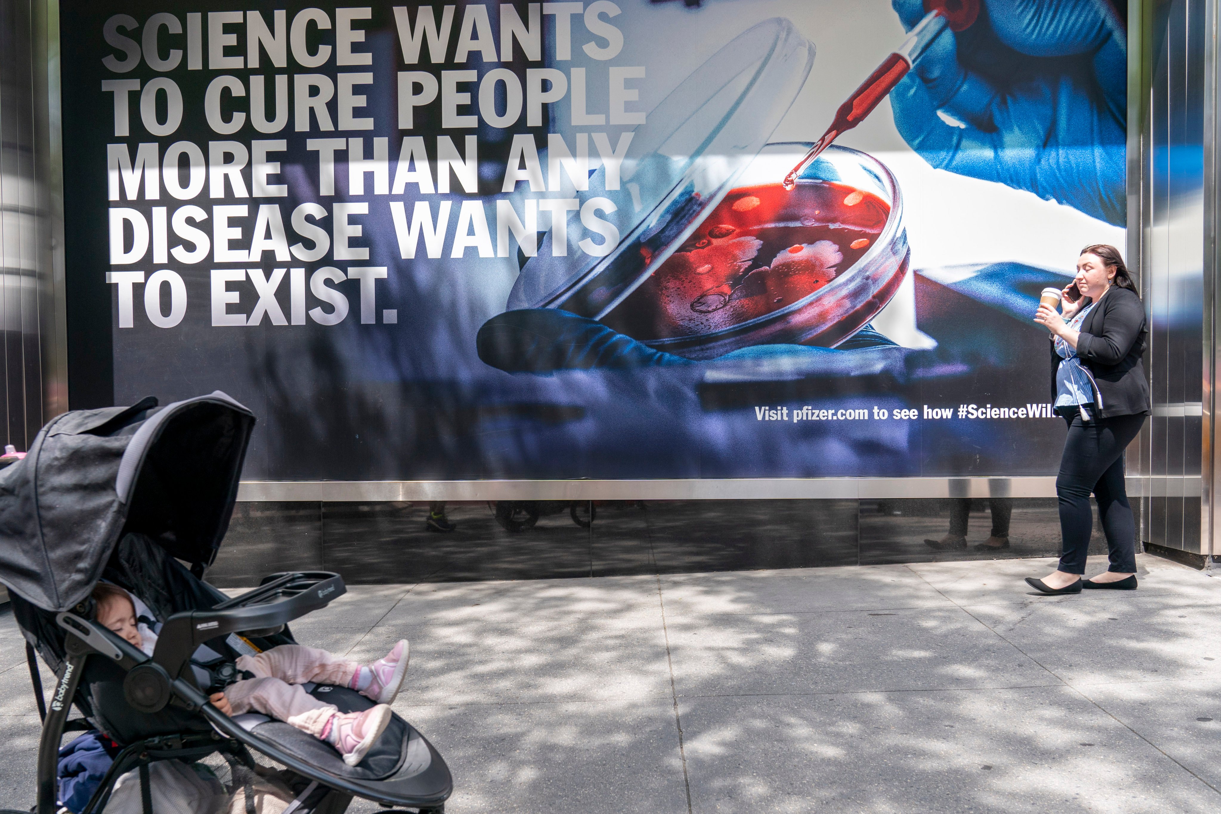 An advertising poster outside Pfizer headquarters in New York. Photo: AP