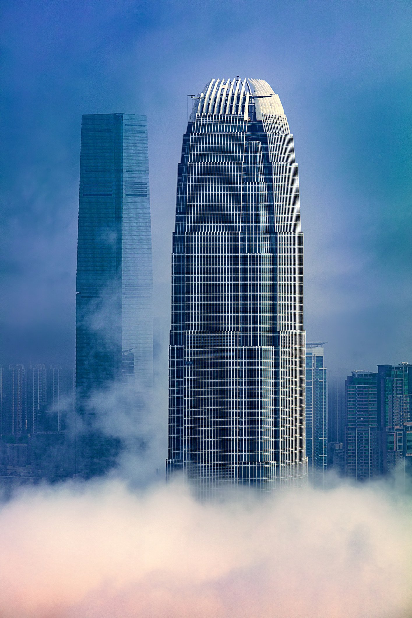 The tops of the IFC (International Finance Centre, right) and ICC (International Commerce Centre), Hong Kong’s two tallest buildings in a city of thousands of skyscrapers. Photo: Getty Images