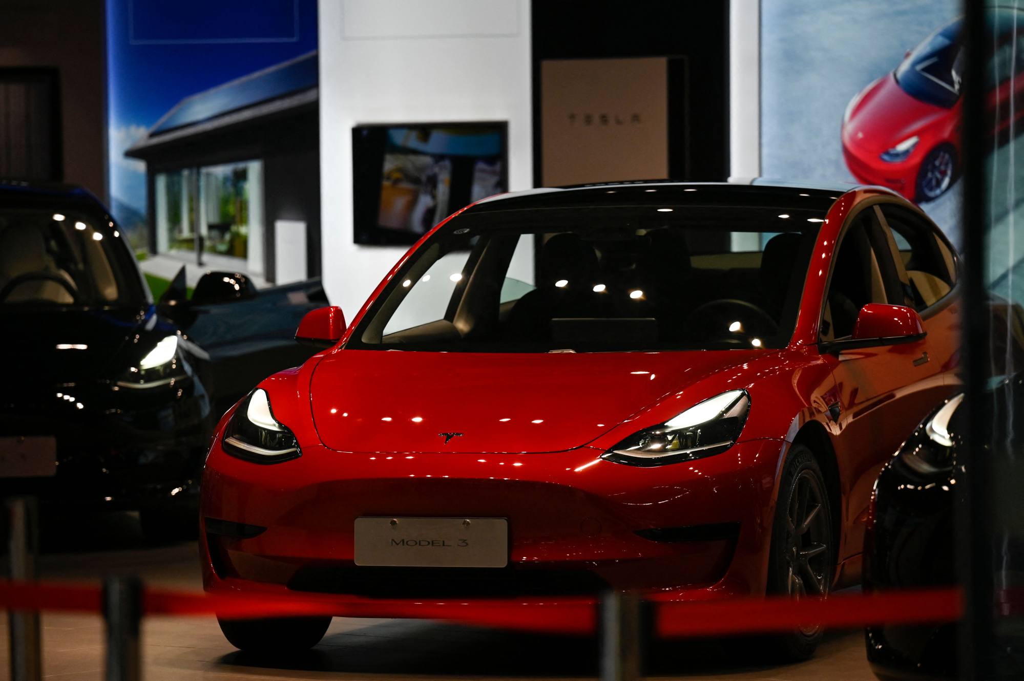 A Tesla Model 3 at a showroom at a shopping mall in Beijing on April 29, 2022. The US-based carmaker is one of thousands of manufacturers whose production plunged amid Shanghai’s long lockdown. Photo: AFP