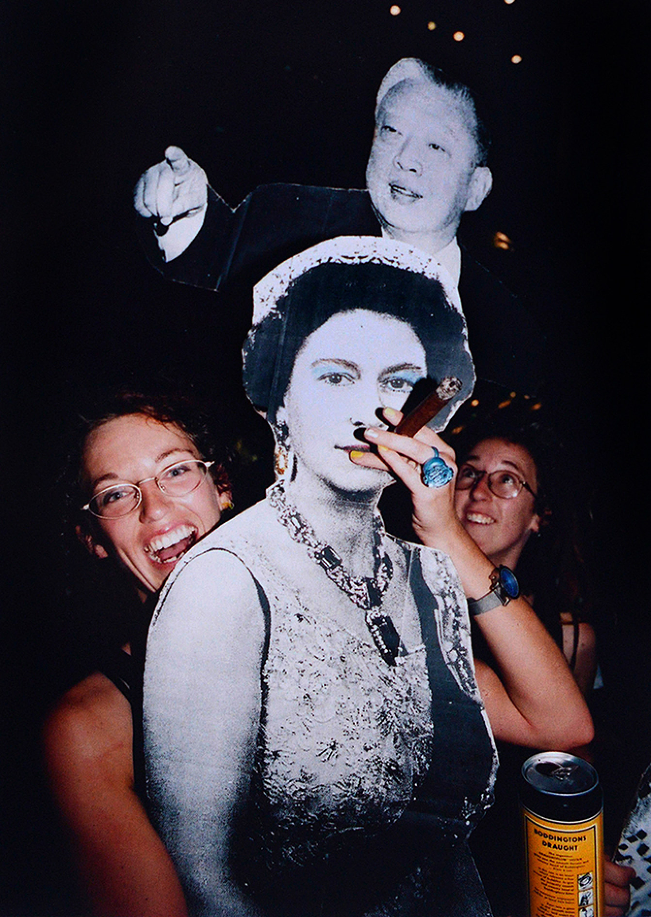 Chu’s photo shows revellers in Times Square at midnight on July 1, 1997, holding up paper cut-outs of Queen Elizabeth and Hong Kong’s first chief executive Tung Chee-hwa. Photo: Yrellag Gallery/Birdy Chu