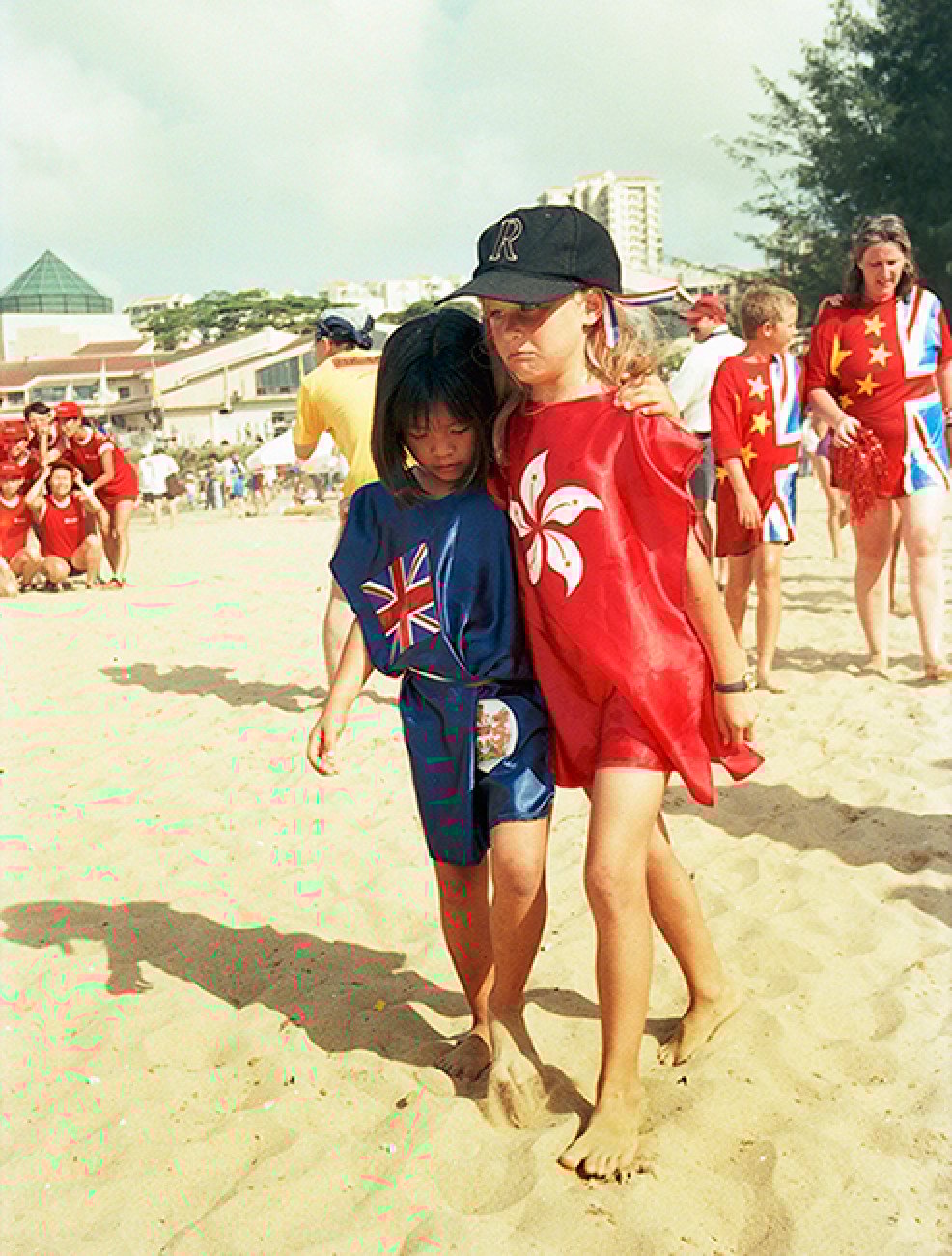 ‘A pair of “sisters” was specially dressed, walking on the beach of Discovery Bay during the International Dragon Boat Festival in 1997.’ (Birdy Chu’s caption.) Photo: Yrellag Gallery / Birdy Chu