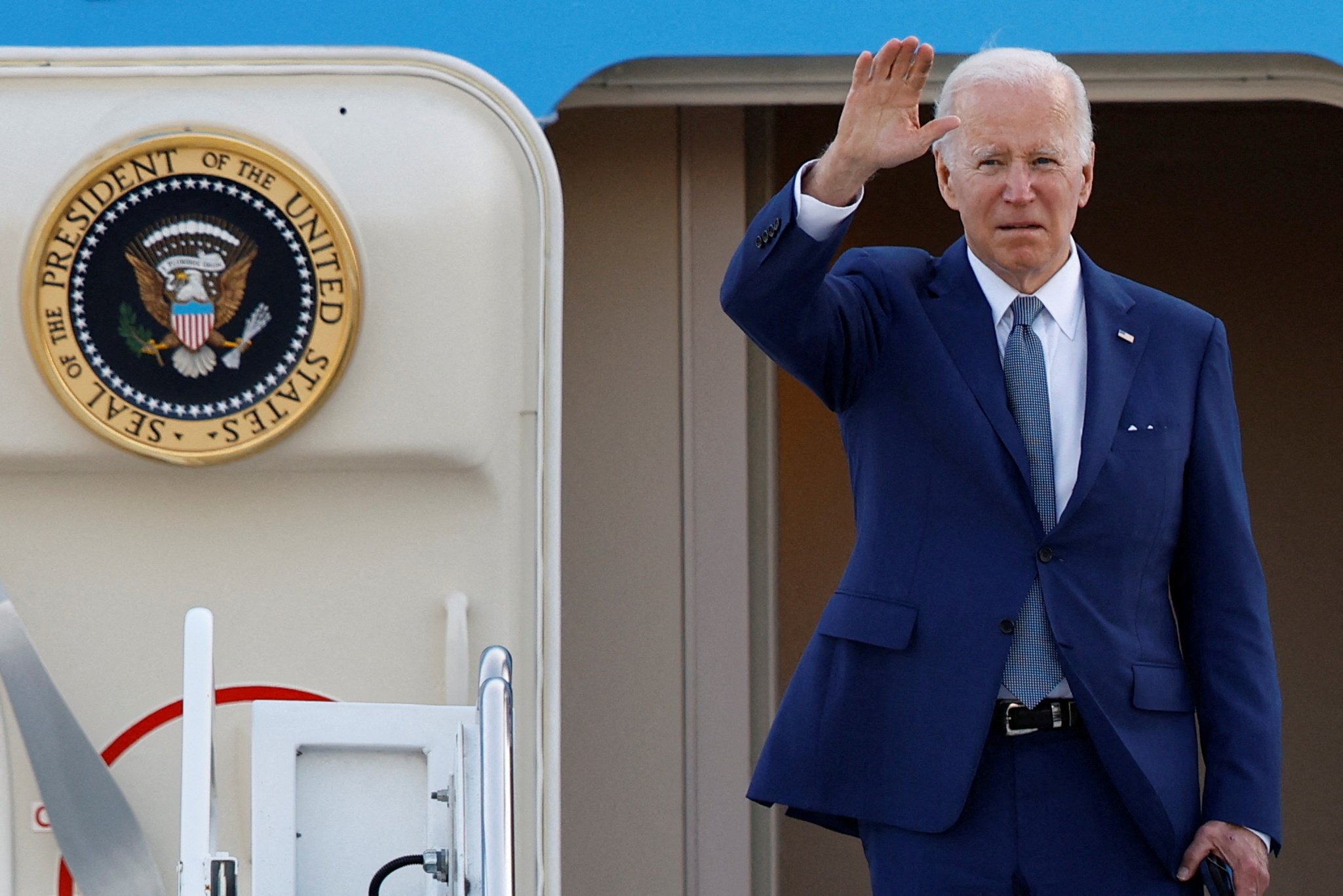 US President Joe Biden gestures as he boards Air Force One to depart from Yokota Air Base on the outskirts of Tokyo, on May 24. Photo: Reuters