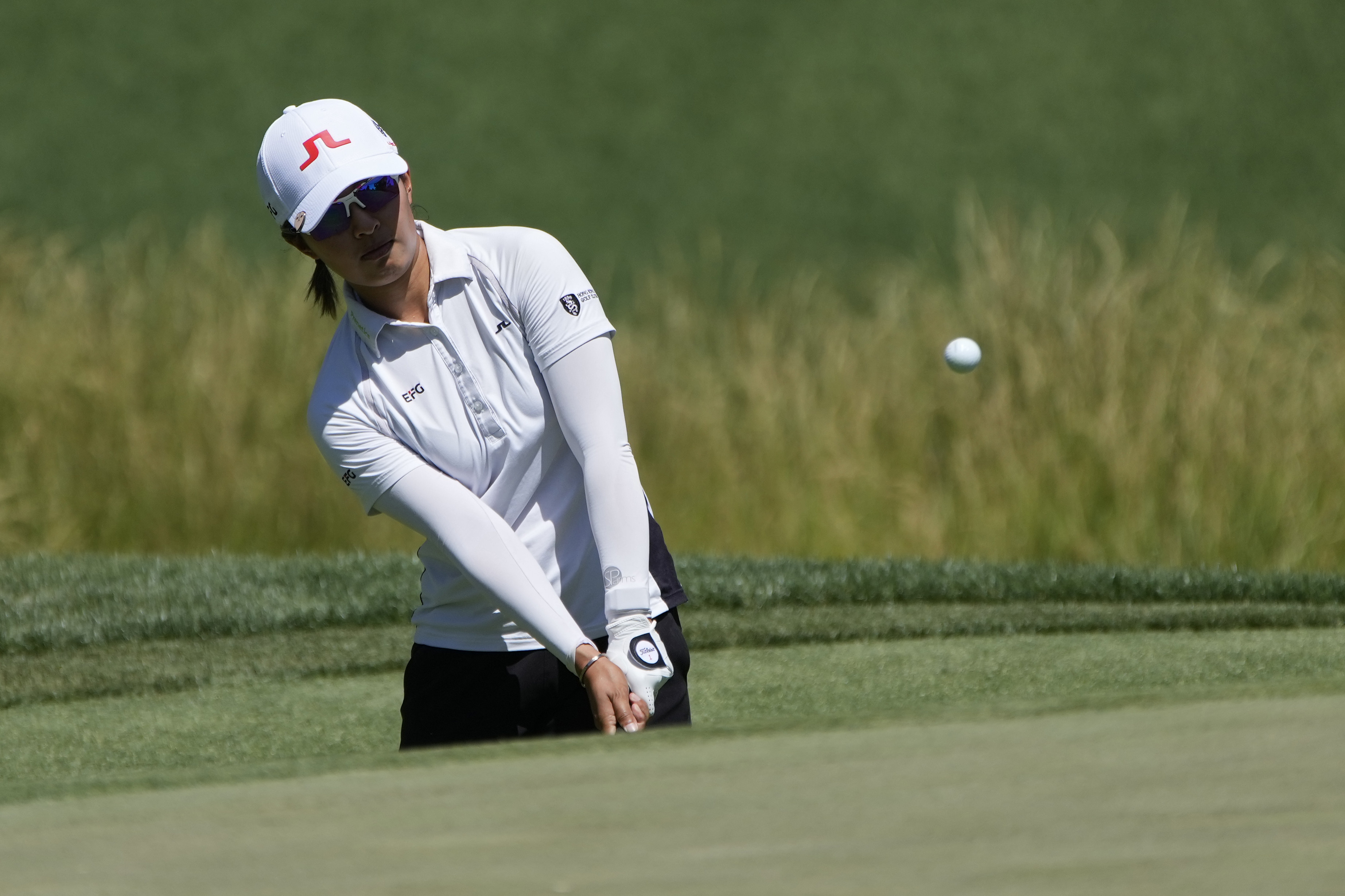 Tiffany Chan chips onto the second green on the third day of play at LPGA Bank of Hope Match Play. Photo: AP