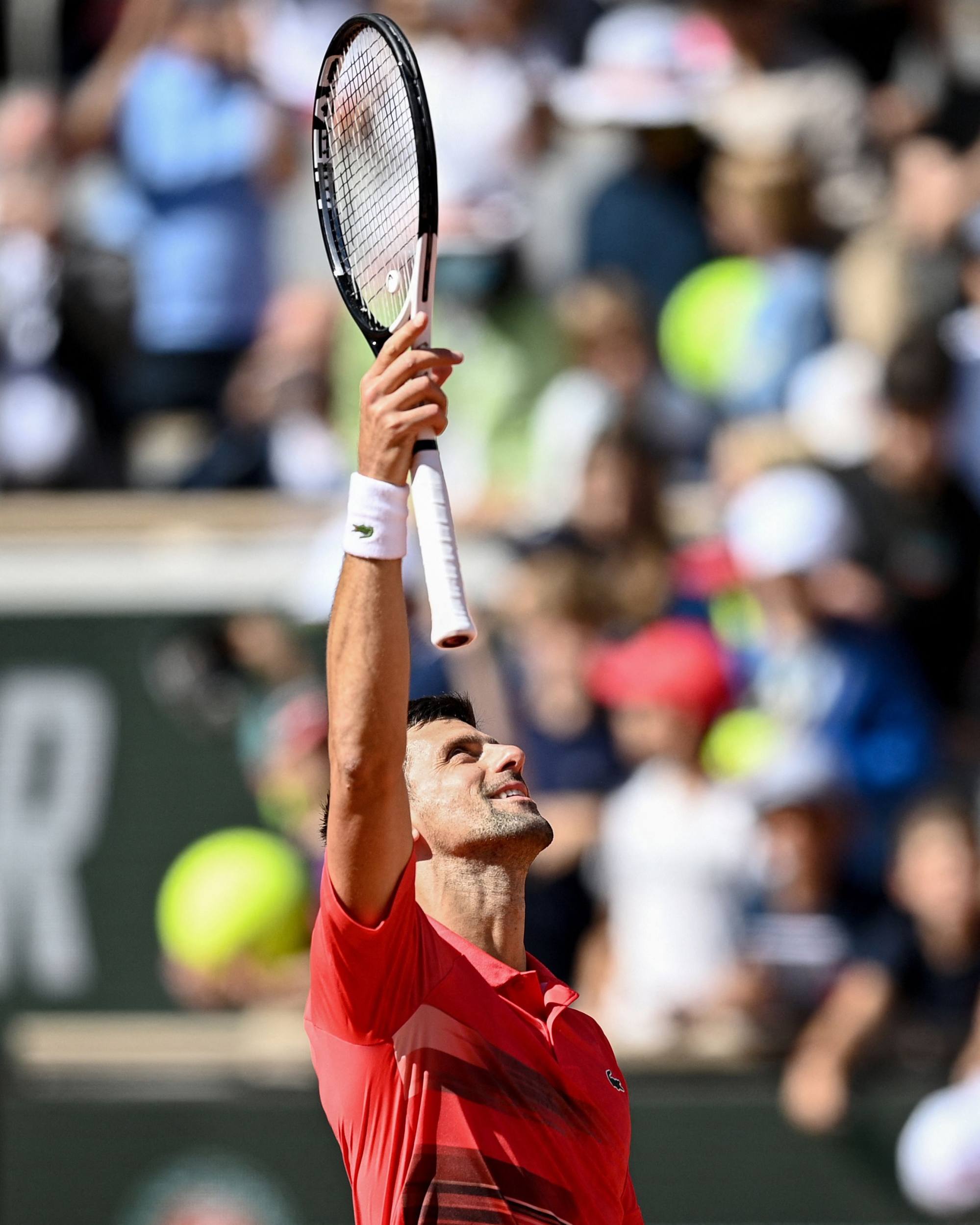 Djokovic reacts after beating Slovenia’s Aljaz Bedene on day six of the Roland Garros. Photo: AFP