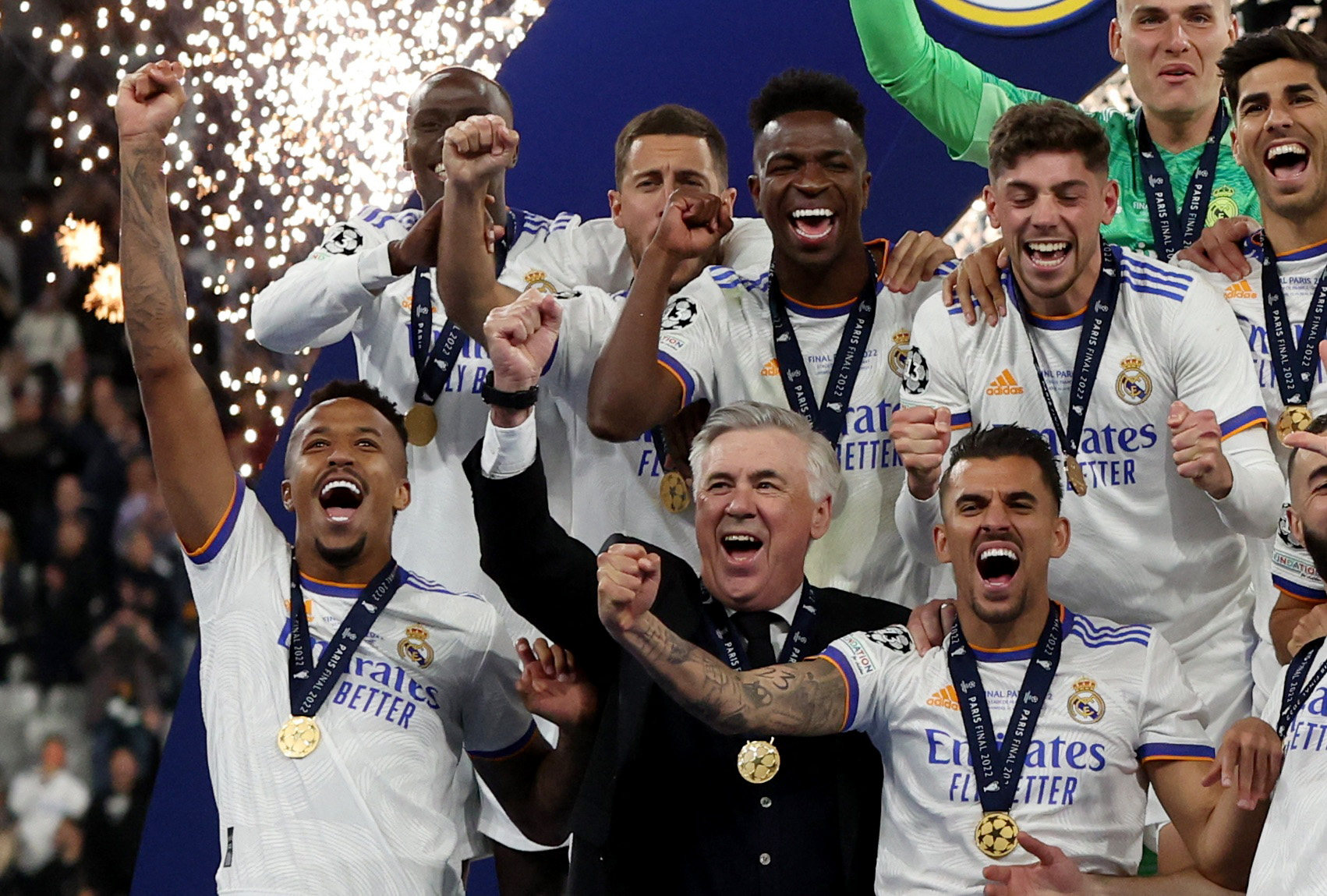Real Madrid coach Carlo Ancelotti celebrates with his players after winning the Champions League at Stade de France. Photo: Reuters